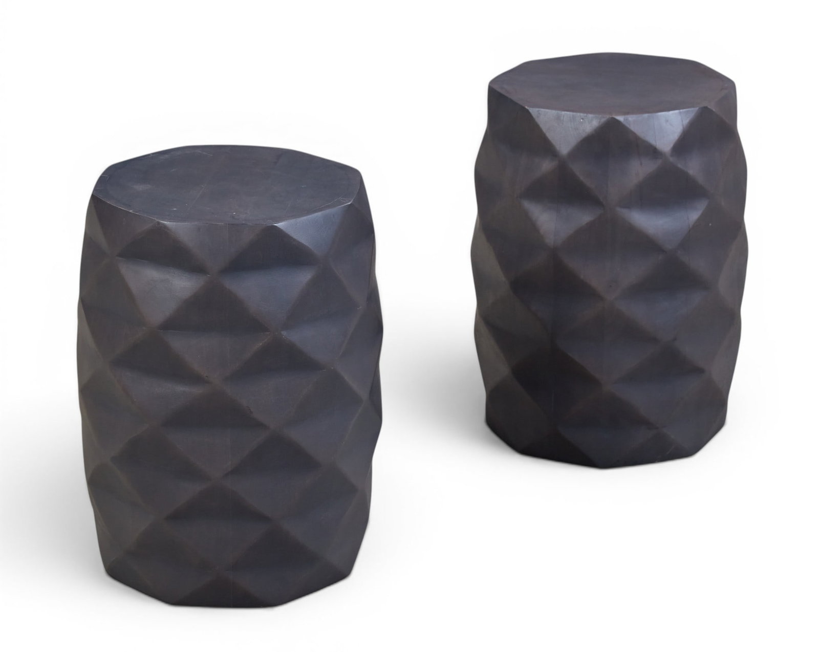 A pair Geometric wooden side stables: A pair Geometric wooden side stables Height 18in; Diameter 12in
