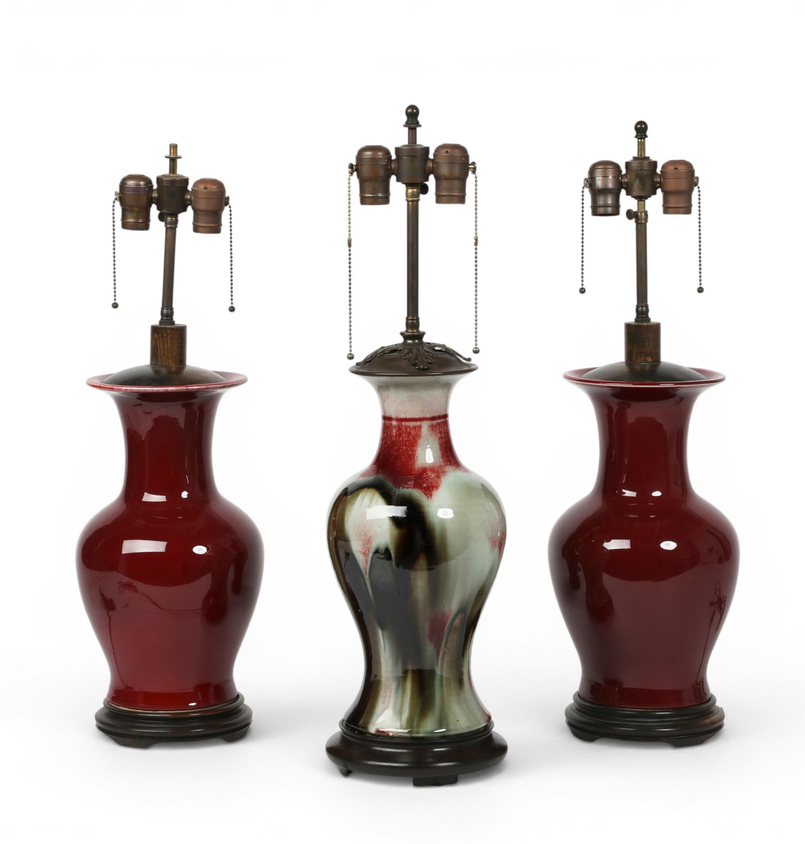 A group of three Chinese porcelain lamps: A group of three Chinese porcelain lamps Overall: height 28 x diameter 7 1/2 in. (71.1 x 19.1 cm.)
