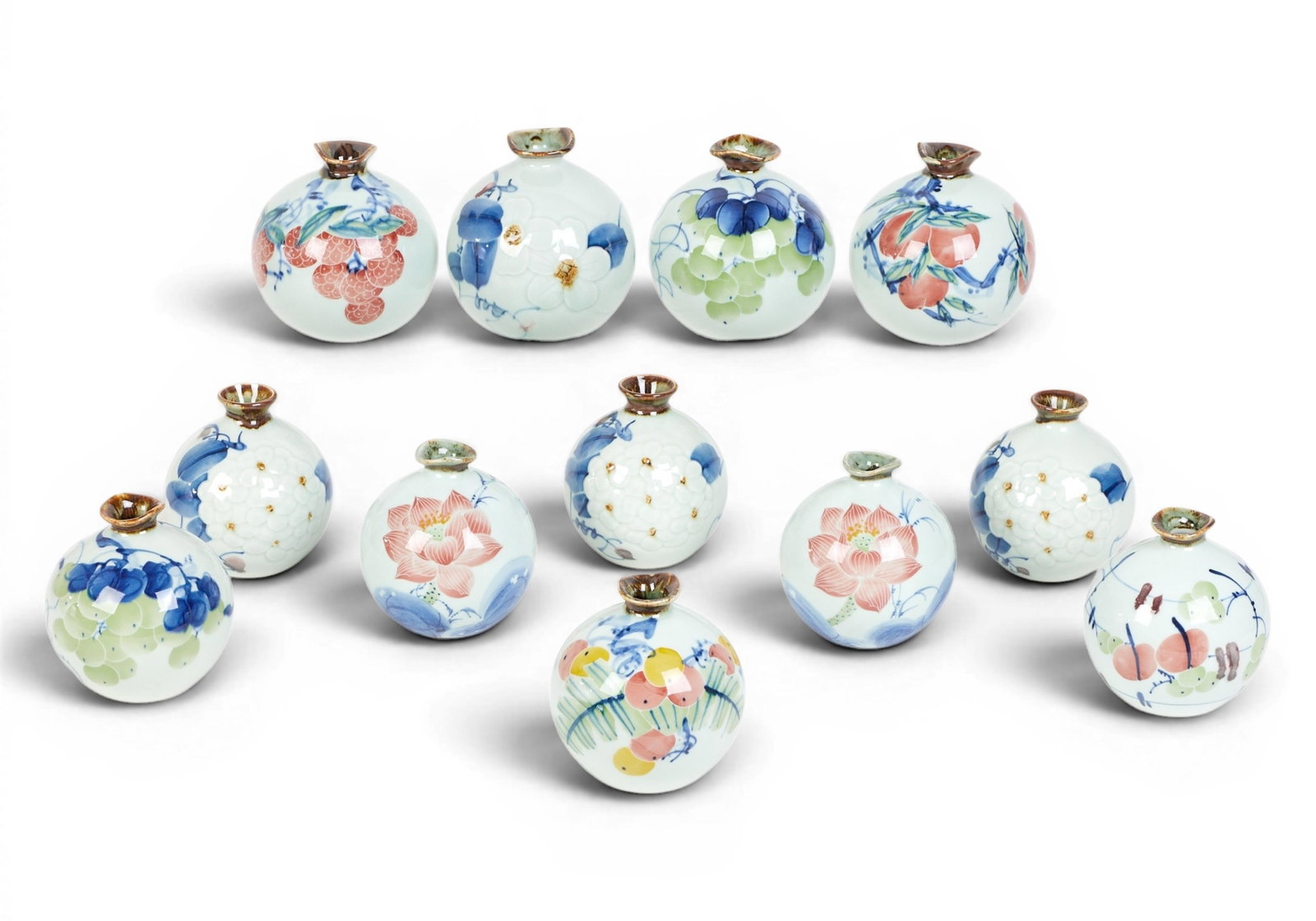 A group of twelve Chinese vases: A group of twelve Chinese vases Tallest: height 5 1/2 x diameter 5 1/2 in. (14 x 14 cm.)
