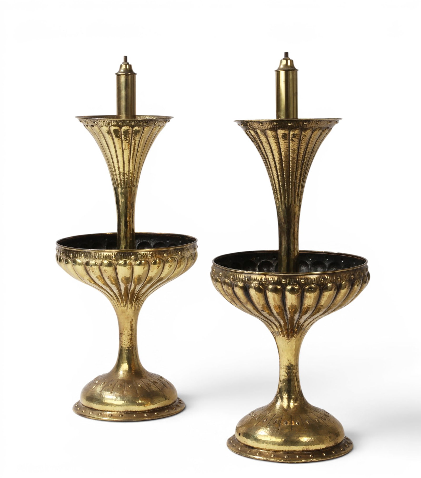 A pair of hammered brass lamps: A pair of hammered brass lamps Overall: height 32 in. (81.3 cm.)