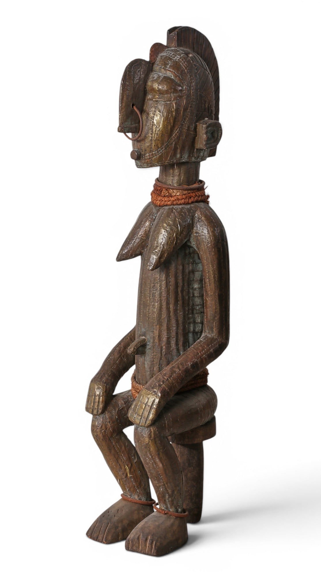 A West African hardwood female figure, possibly Senufo culture (1 of 5)