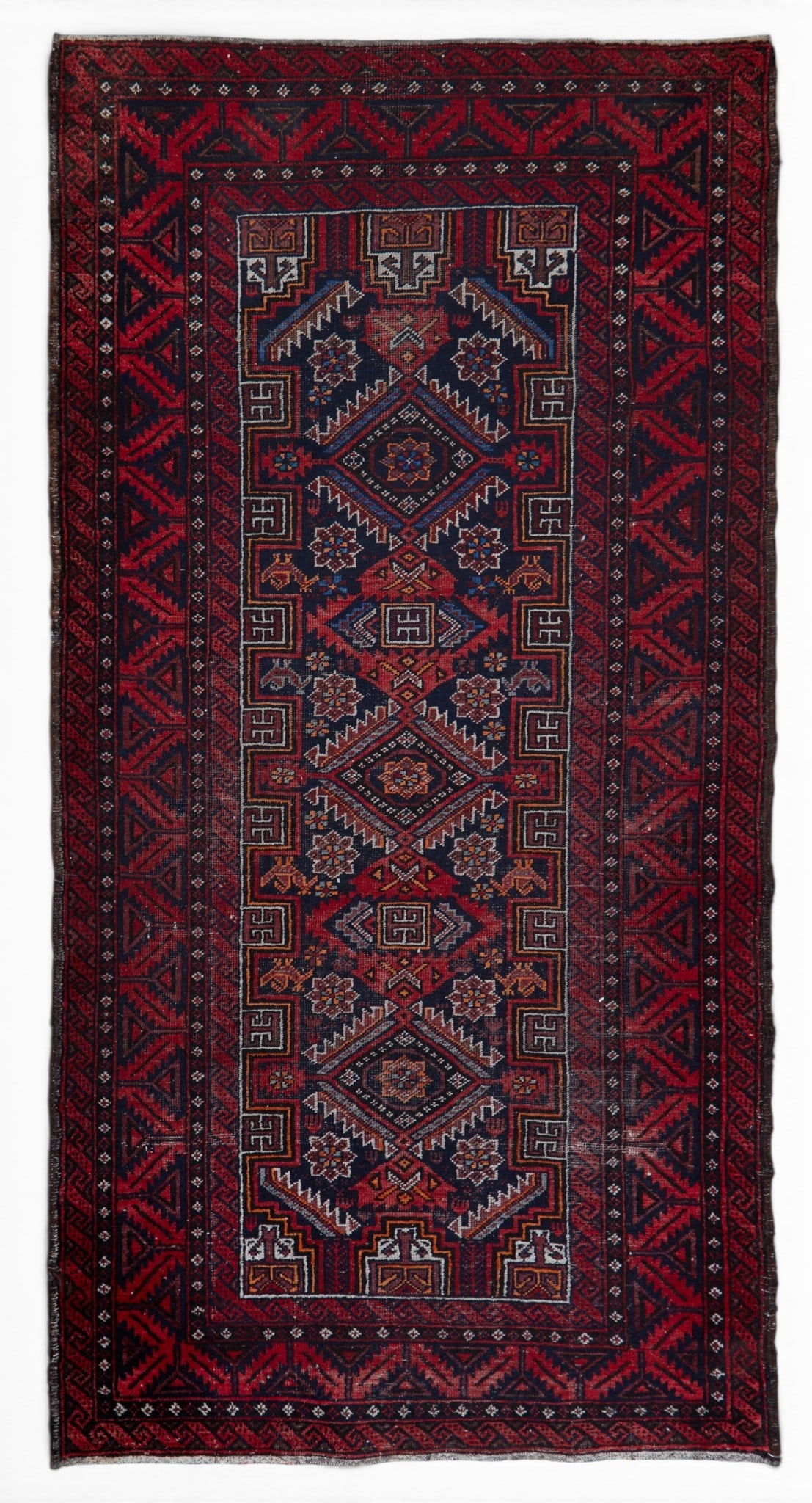 A Baluch rug, Afghanistan: A Baluch rug Afghanistan approximately 3ft x 6ft 5in (91x 198cm)