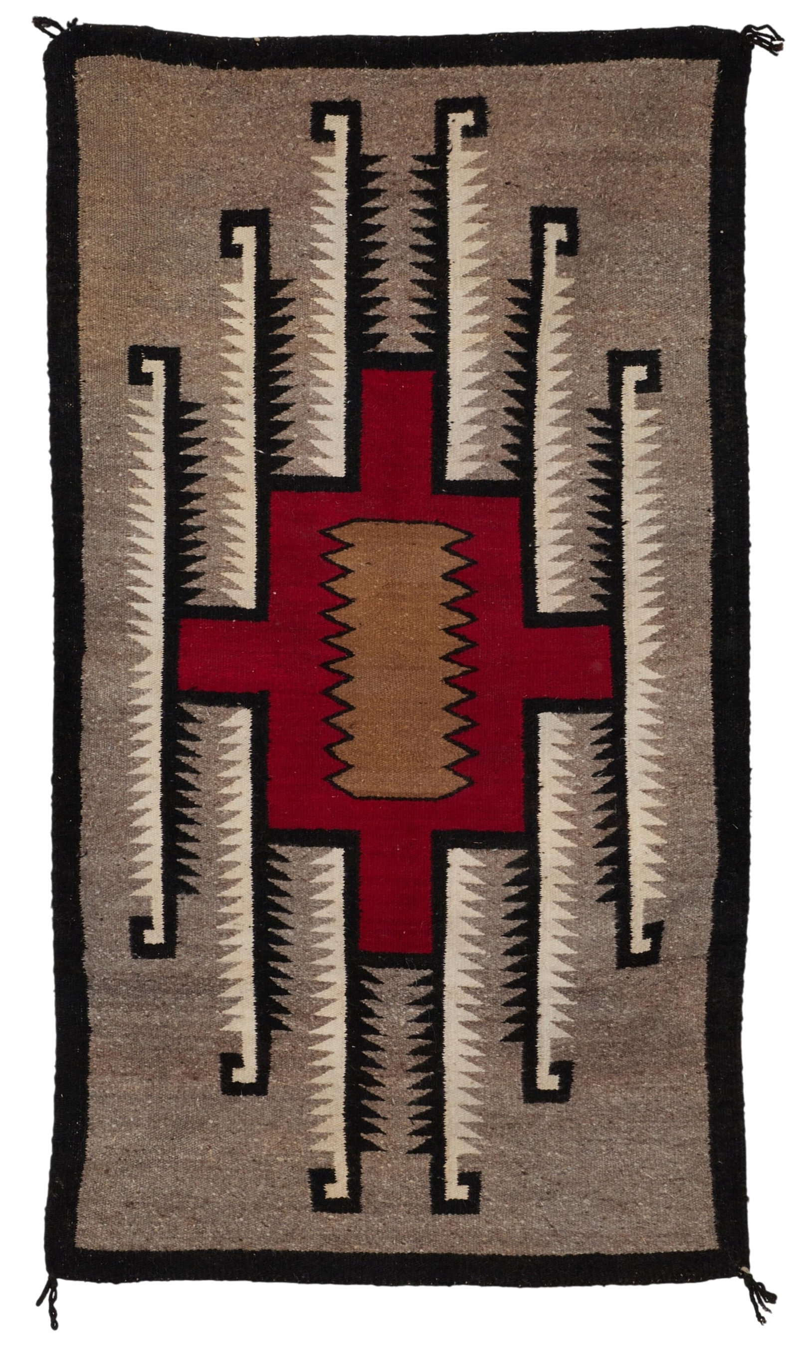 A Navajo hand woven rug: A Navajo hand woven rug 50 x 28 in. (127 x 71.1 cm.)