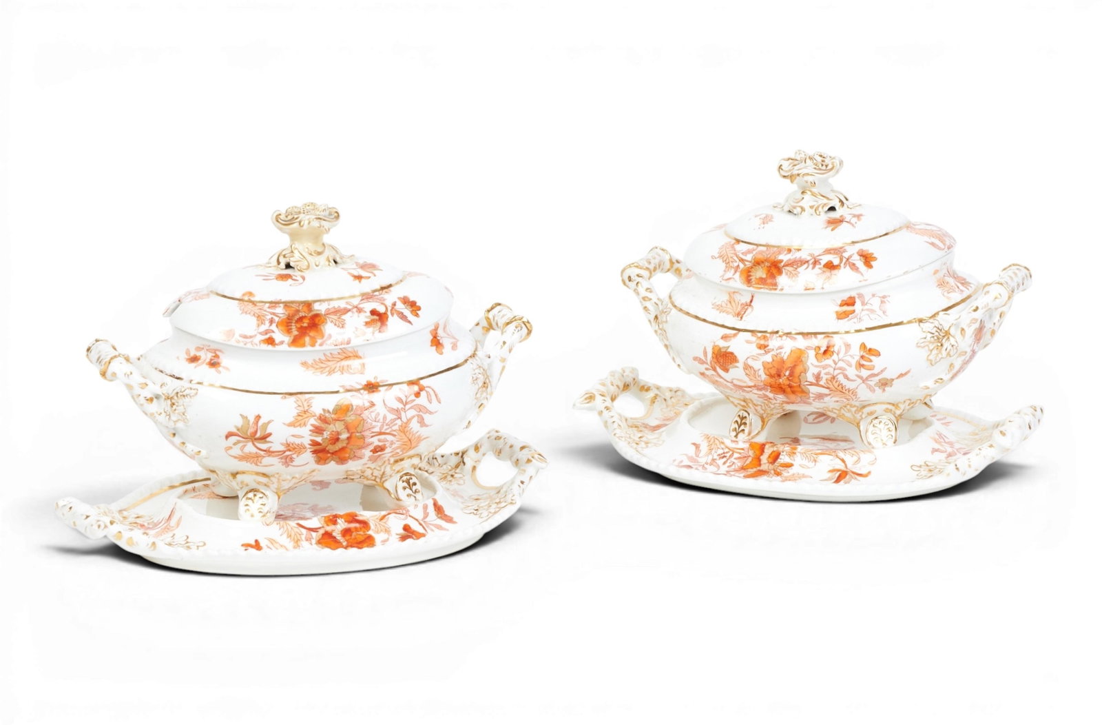 A pair of 19th century porcelain covered sauce tureens on stand: A pair of 19th century porcelain covered sauce tureens on stand height 7 x width 9 1/2 x depth 6 in. (17.8 x 24.1 x 15.2 cm.)
