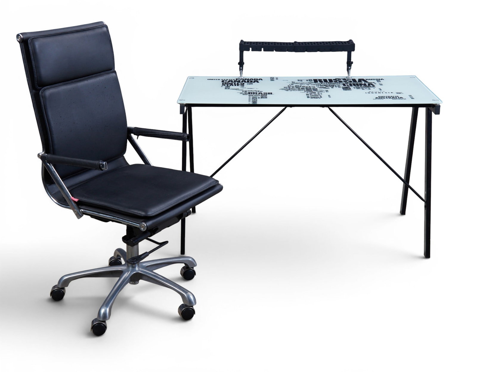 A contemporary ebonized glass top desk with a desk chair: A contemporary ebonized glass top desk with a desk chair Table: height 28 1/2 x width 44 1/2 x depth 22 3/4 in. (72.4 x 113 x 57.8 cm.)