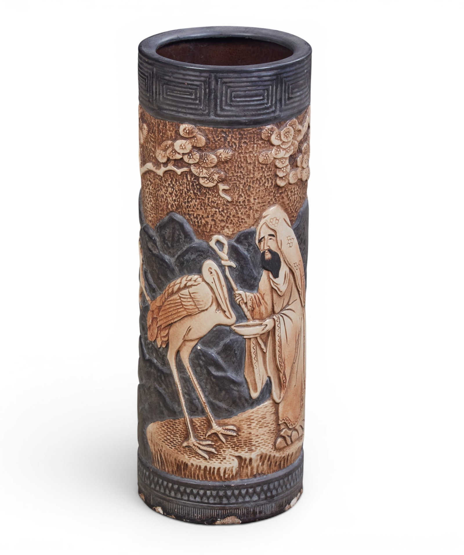 A Bretby painted earthenware stick stand: A Bretby painted earthenware stick stand height 24 1/2in diameter 9in