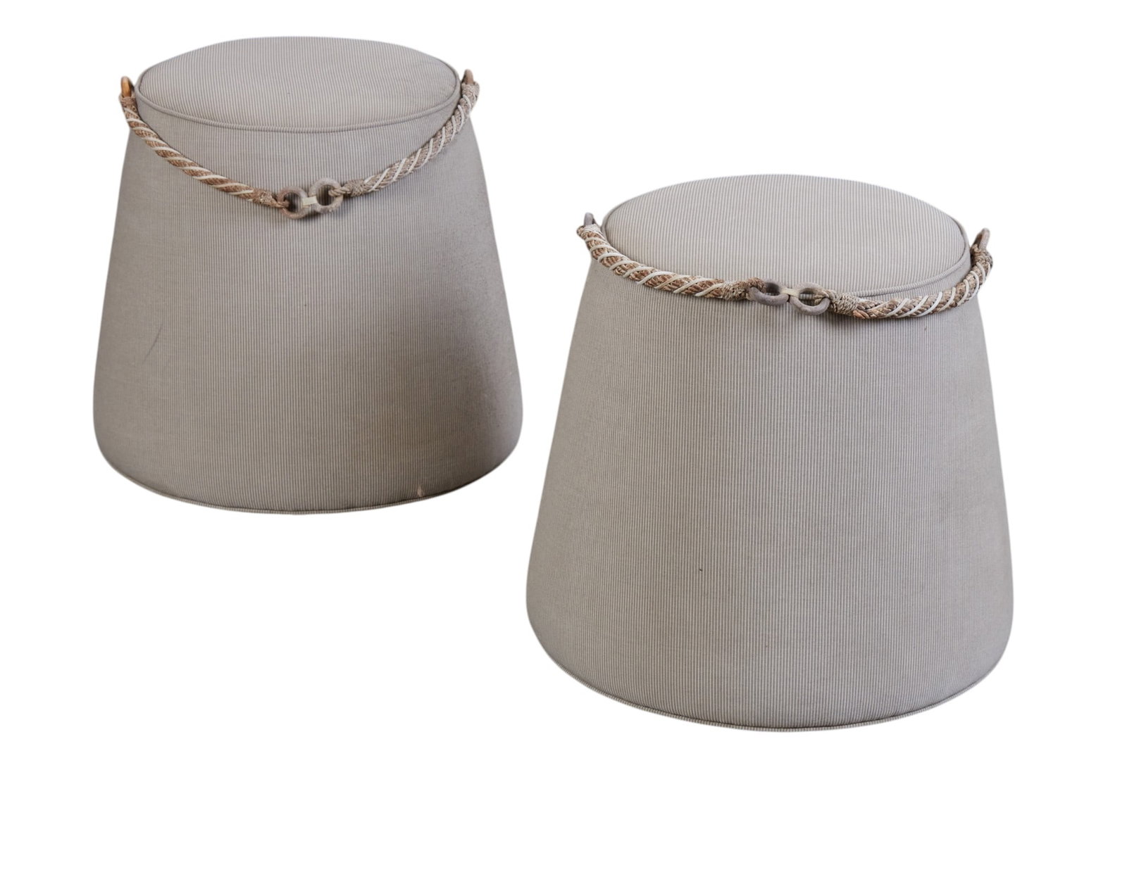A pair of upholstered stools: A pair of upholstered stools height 18 x diameter 16 in. (45.7 x 40.6 cm.)