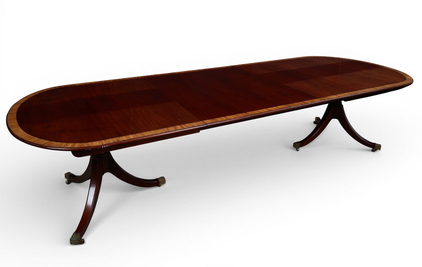 A Kindel two pedestal mahogany dining room table with satin band border and leaf (1 of 9)