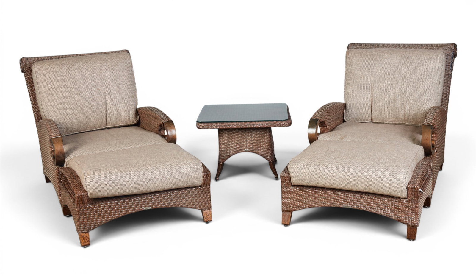 A pair of Cast Classics armchairs with matching ottoman and a side table with glass top: A pair of Cast Classics armchairs with matching ottoman and a side table with glass top Armchair: height 40 x width 33 1/2 x depth 42 in. (101.6 x 85.1 x 106.7 cm.)