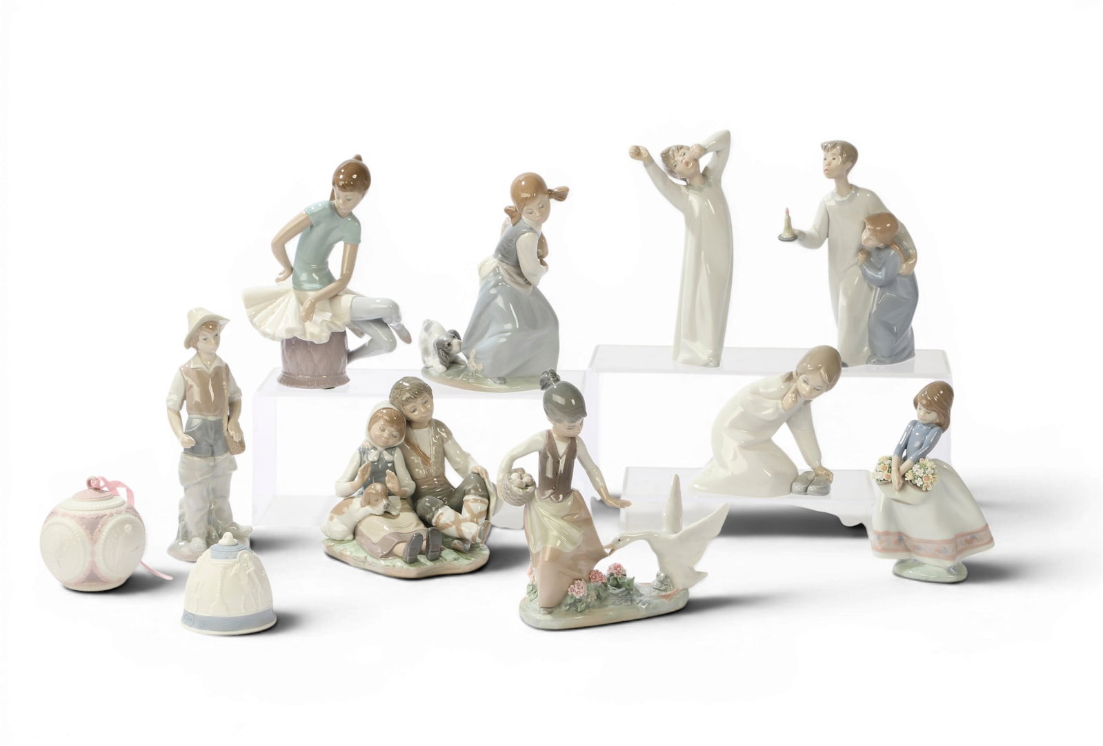 An assembled collection of eleven Lladro porcelain figural groups and decorations, 20th century (1 of 10)