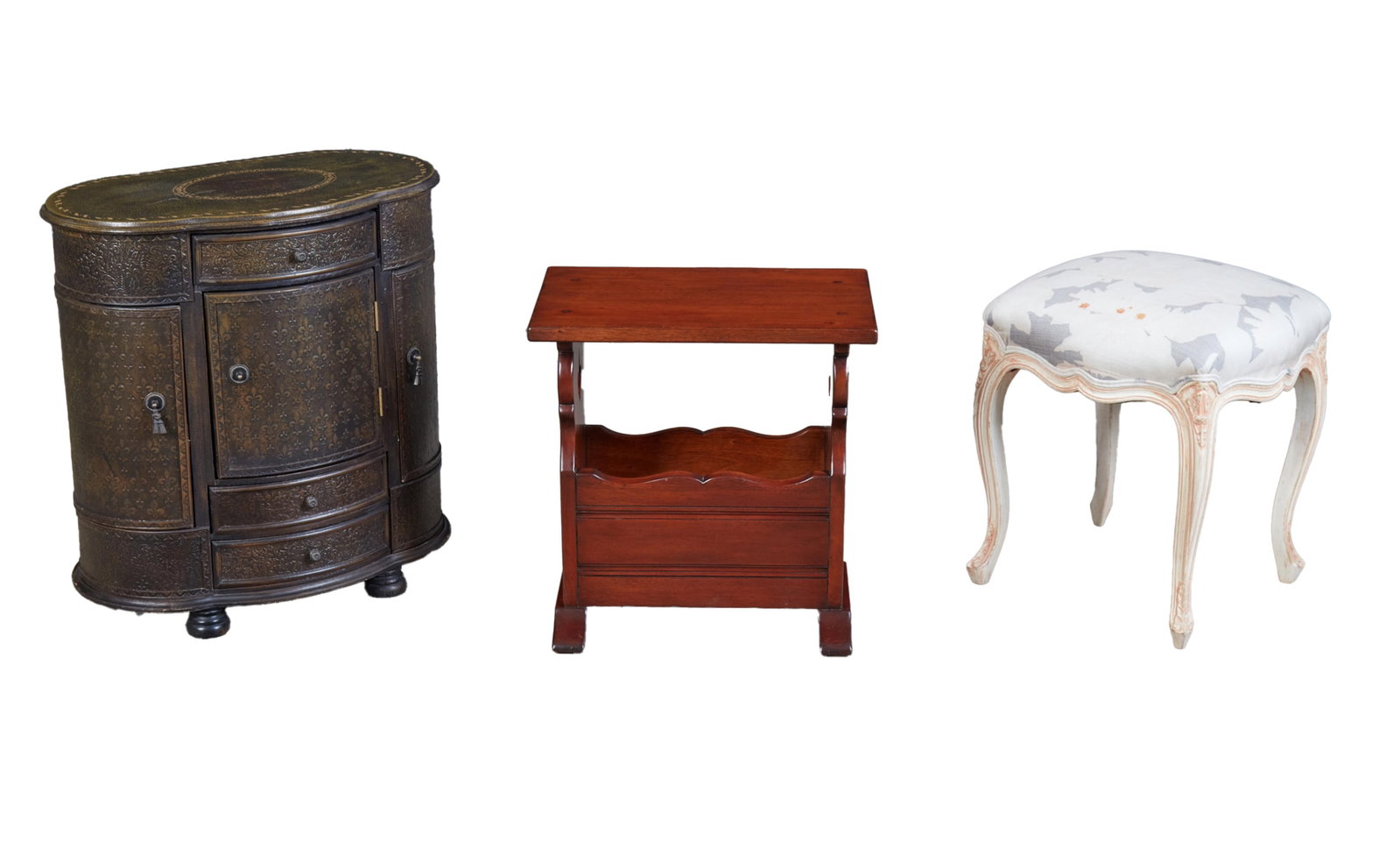 A painted dark green cabinet together with magazine rack and upholstered stool: A painted dark green cabinet together with magazine rack and upholstered stool Painted Cabinet: height 27 x width 25 x depth 15 in. (68.6 x 63.5 x 38.1 cm.)