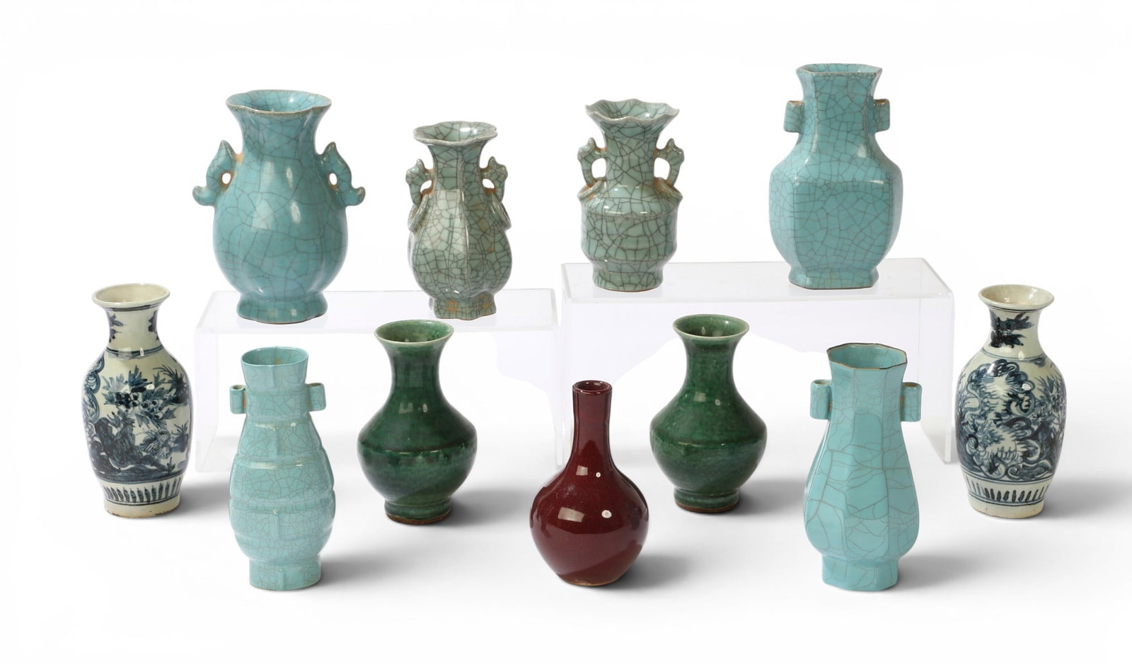 A group of eleven Chinese vases: A group of eleven Chinese vases Largest: height 7 1/2 x diameter 5 1/2 in. (19.1 x 14 cm.)