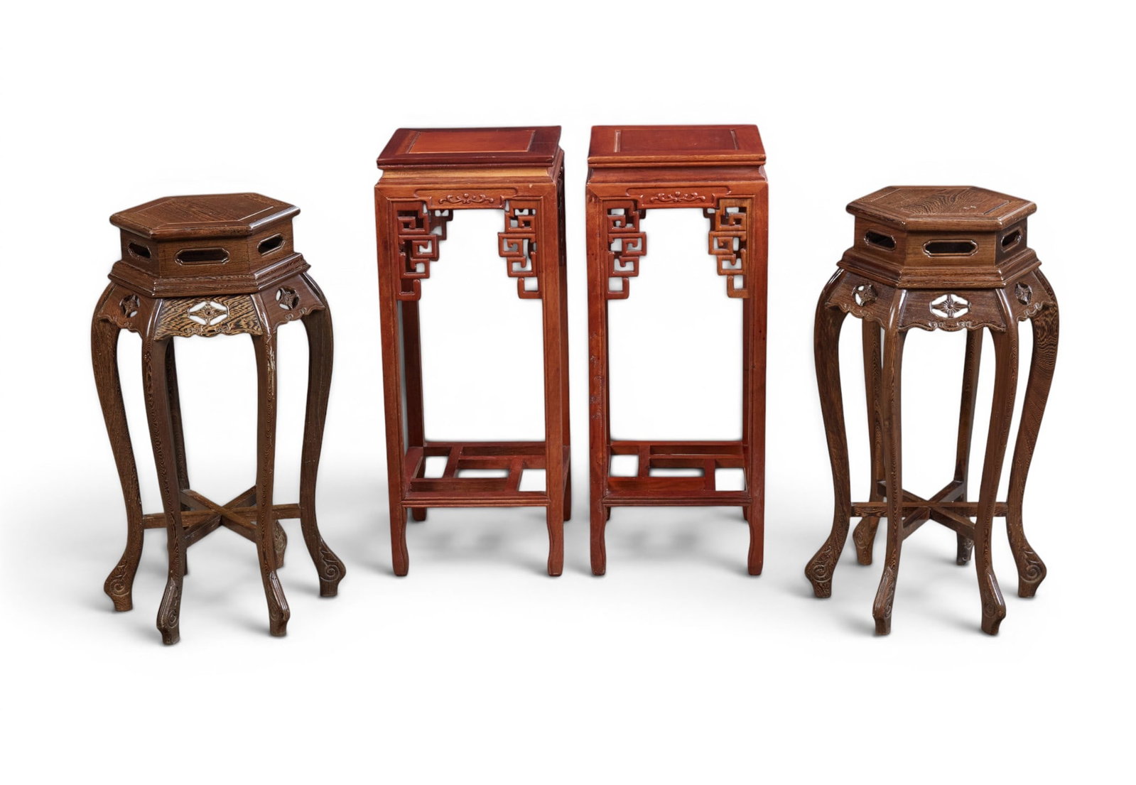 A group of four Chinese tables: A group of four Chinese tables Tallest pair: height 32 x width 12 1/2 x length 12 1/2 in. (81.3 x 31.8 x 31.8 cm.)