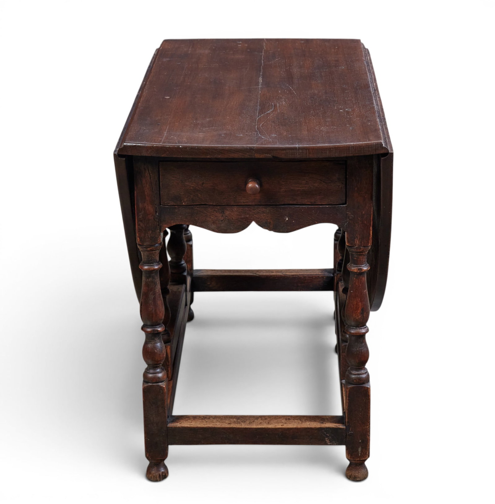 An oval drop leaf table with single drawer - 2