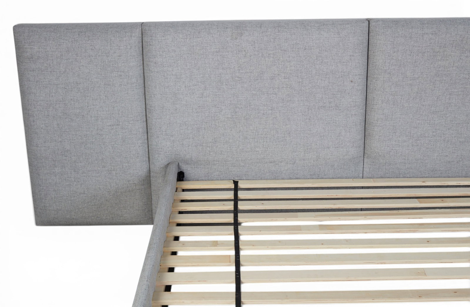 A grey upholstered king size bed - 6