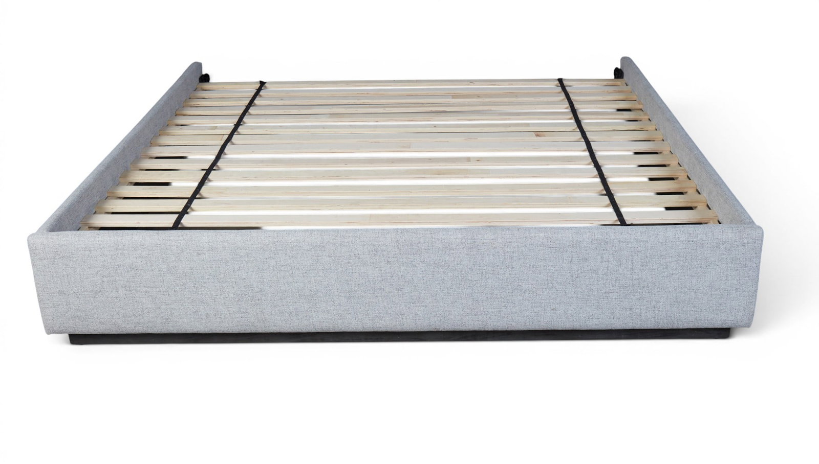A grey upholstered king size bed - 8