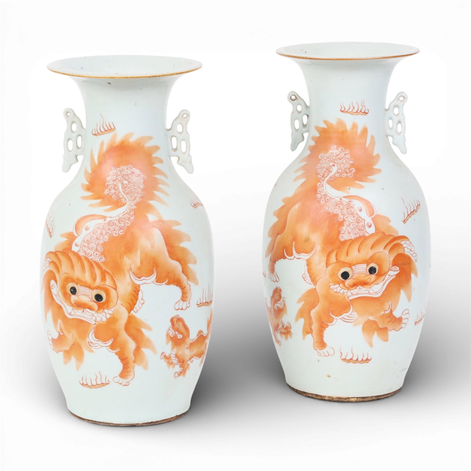 A pair of Chinese iron red and white porcelain dragon vases (1 of 4)