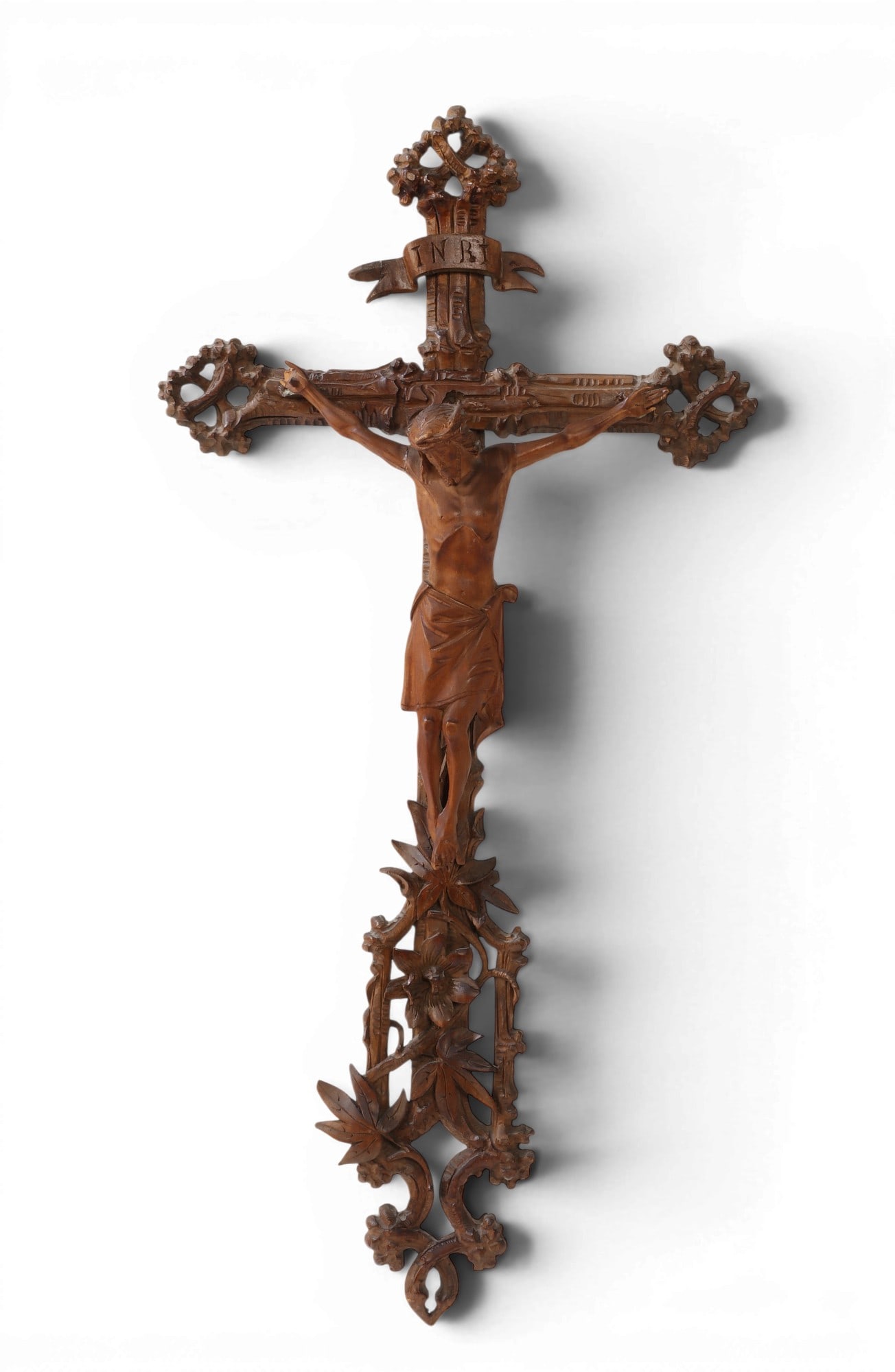 A Black Forest carved lindenwood crucifix, late 19th/early 20th century (1 of 3)