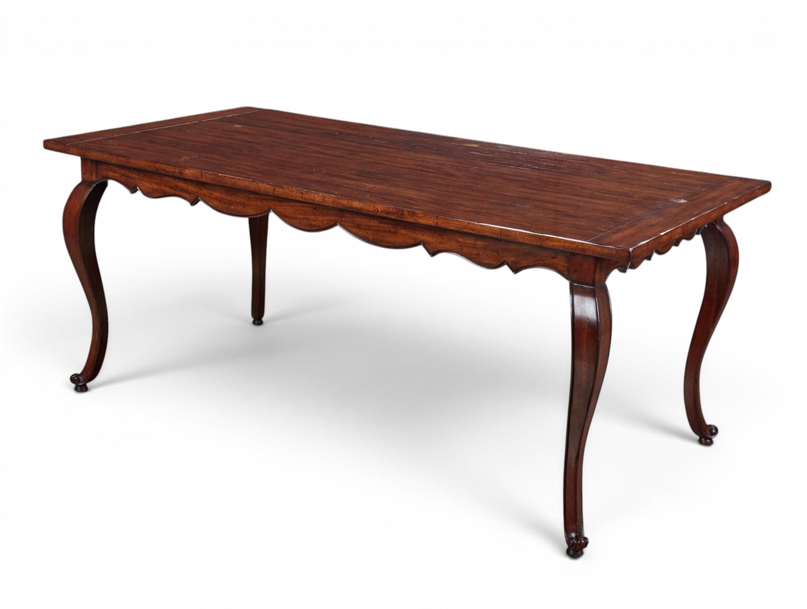 A French Provincial style stained walnut farmhouse table, post 1950: A French Provincial style stained walnut farmhouse table post 1950 height 30in (76cm); width 72in (183cm); depth 36in (91.5cm) Provenance: Property from the Collection of Ben Nysewander, Carmel, Calif