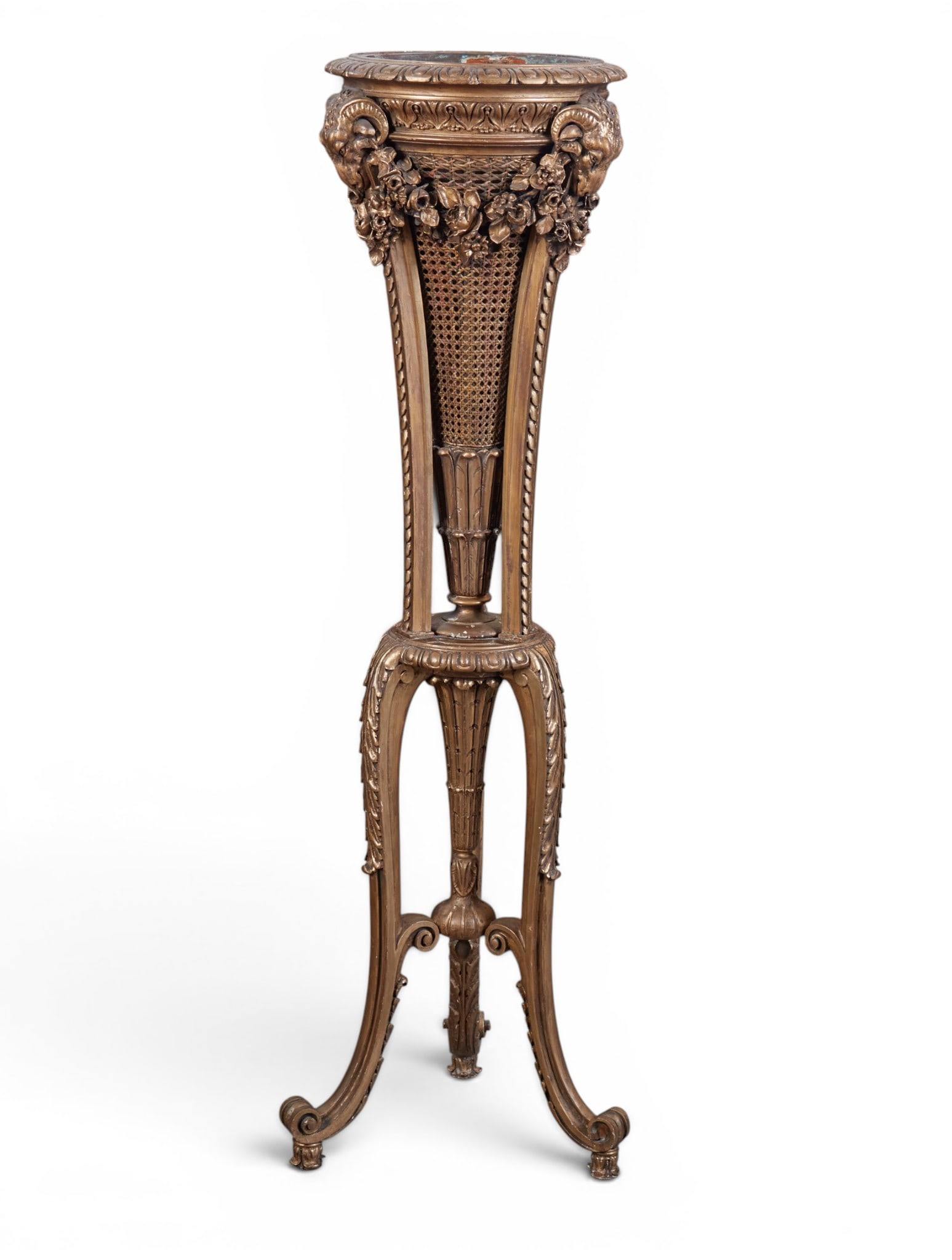 A Louis XVI style giltwood and caned pedestal jardiniere, 20th century: A Louis XVI style giltwood and caned pedestal jardiniere 20th century With copper liner. height 52 1/2in (133cm); diameter 16 1/2in (42cm) Provenance: Property from the Collection of Ben Nysewander