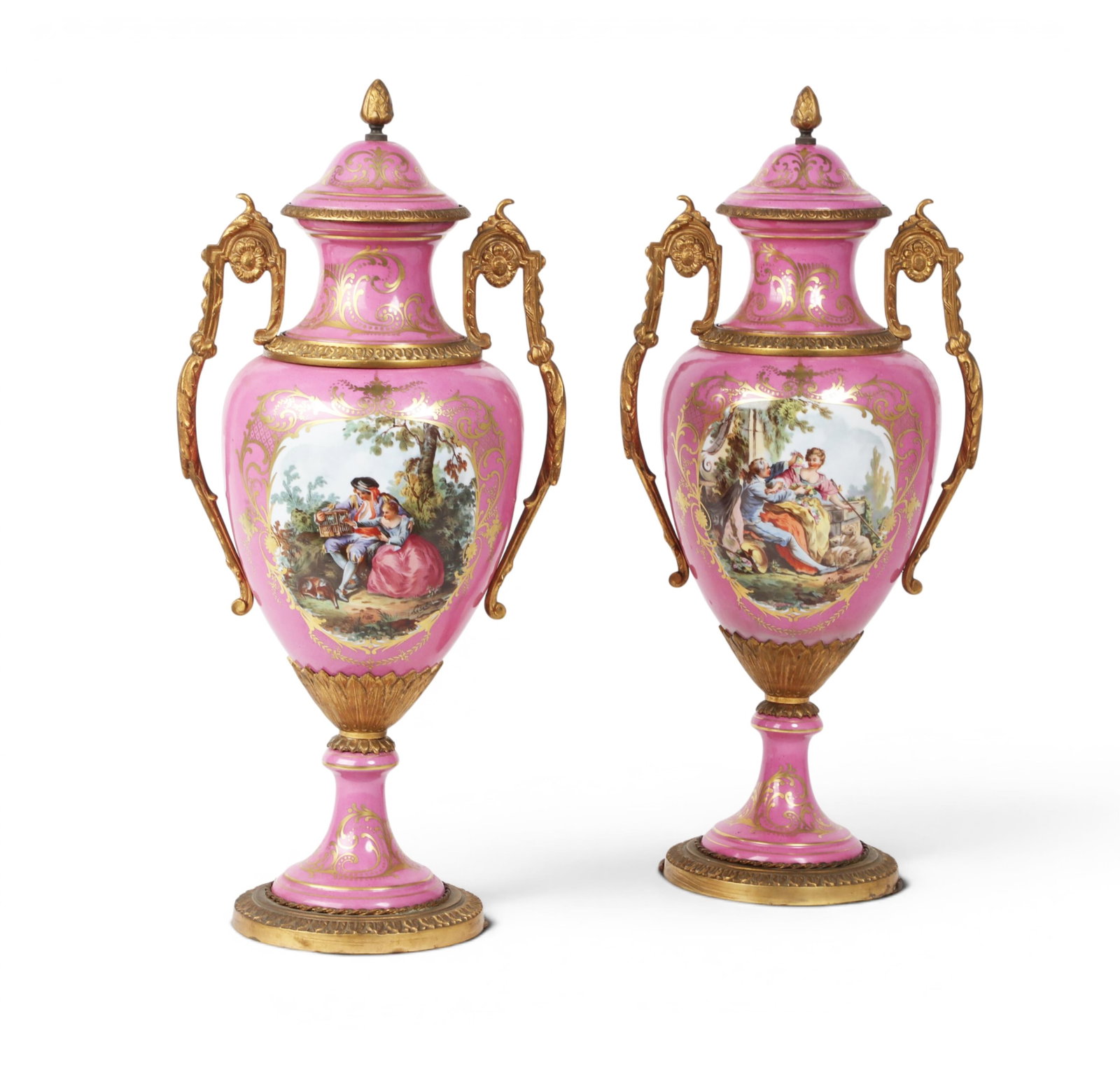 A pair of Sevres style gilt metal mounted pink porcelain covered urns, 20th century (1 of 3)