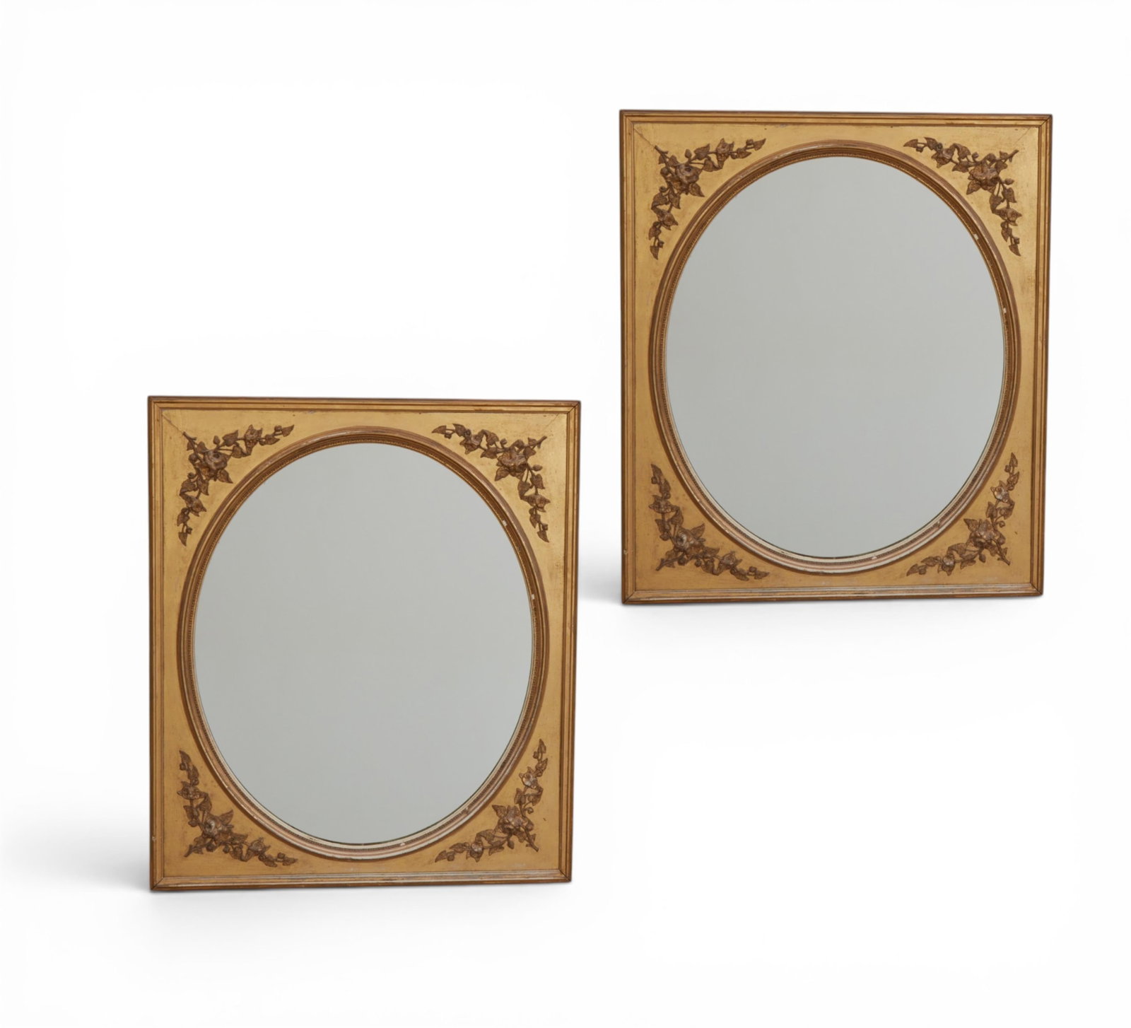 A pair of giltwood and gesso mirrors, 20th century: A pair of giltwood and gesso mirrors 20th century height 35 5/8in (90.5cm); width 30 5/8in (78cm) Provenance: Property from the Collection of Ben Nysewander, Carmel, California.
