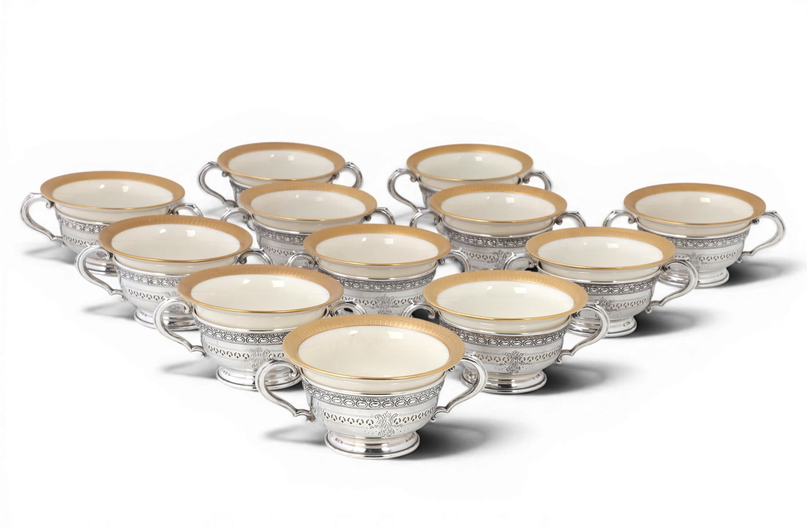 A set of twelve Mauser sterling silver bouillon bowl frames, early 20th century (1 of 5)