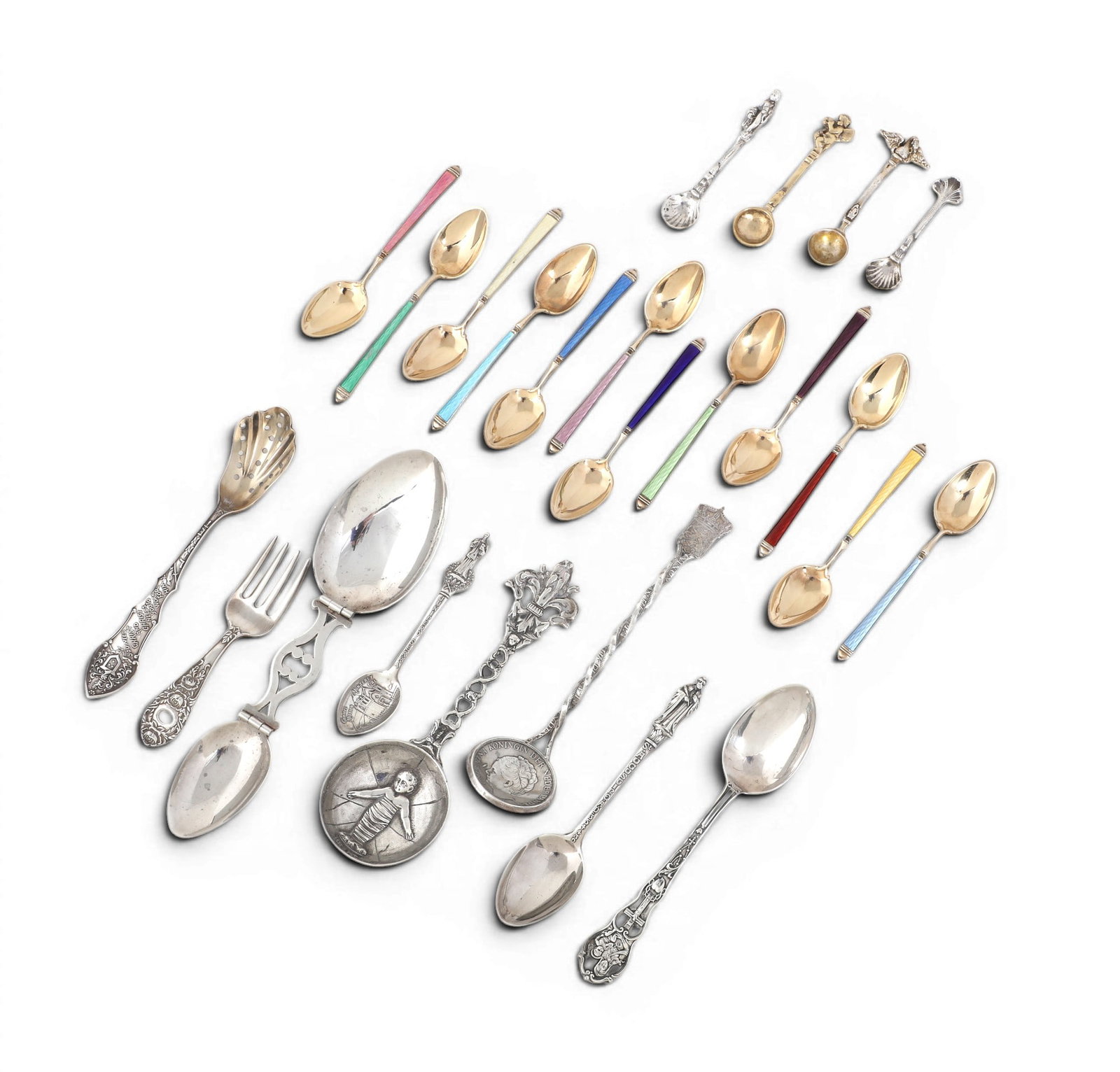 An assembled twenty four piece group of International silver spoons and utensils: An assembled twenty four piece group of International silver spoons and utensils various makers 20th century Comprising 12 enameled demitasse spoons, 1 baby fork, 1 folding medicine spoon, 1 apostle s