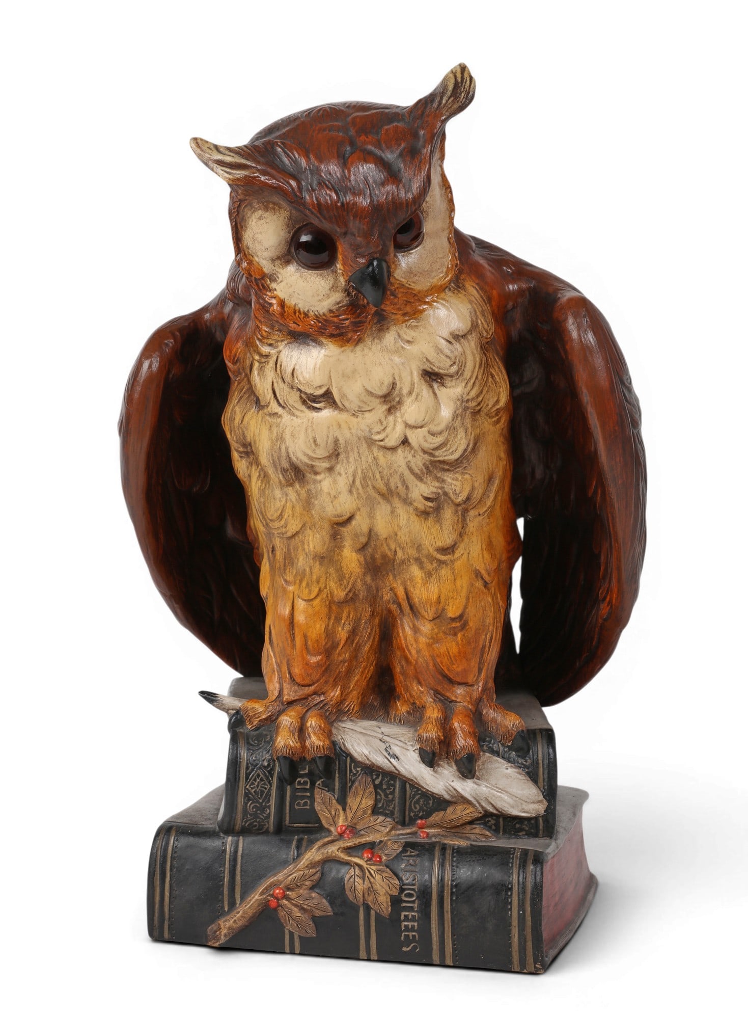 A Johann Maresch polychrome painted terracotta model of an owl standing atop two books: A Johann Maresch polychrome painted terracotta model of an owl standing atop two books late 19th/early 20th century With inset glass eyes, impressed JMm / Austria / 8952 to interior. height 20 3/4in (