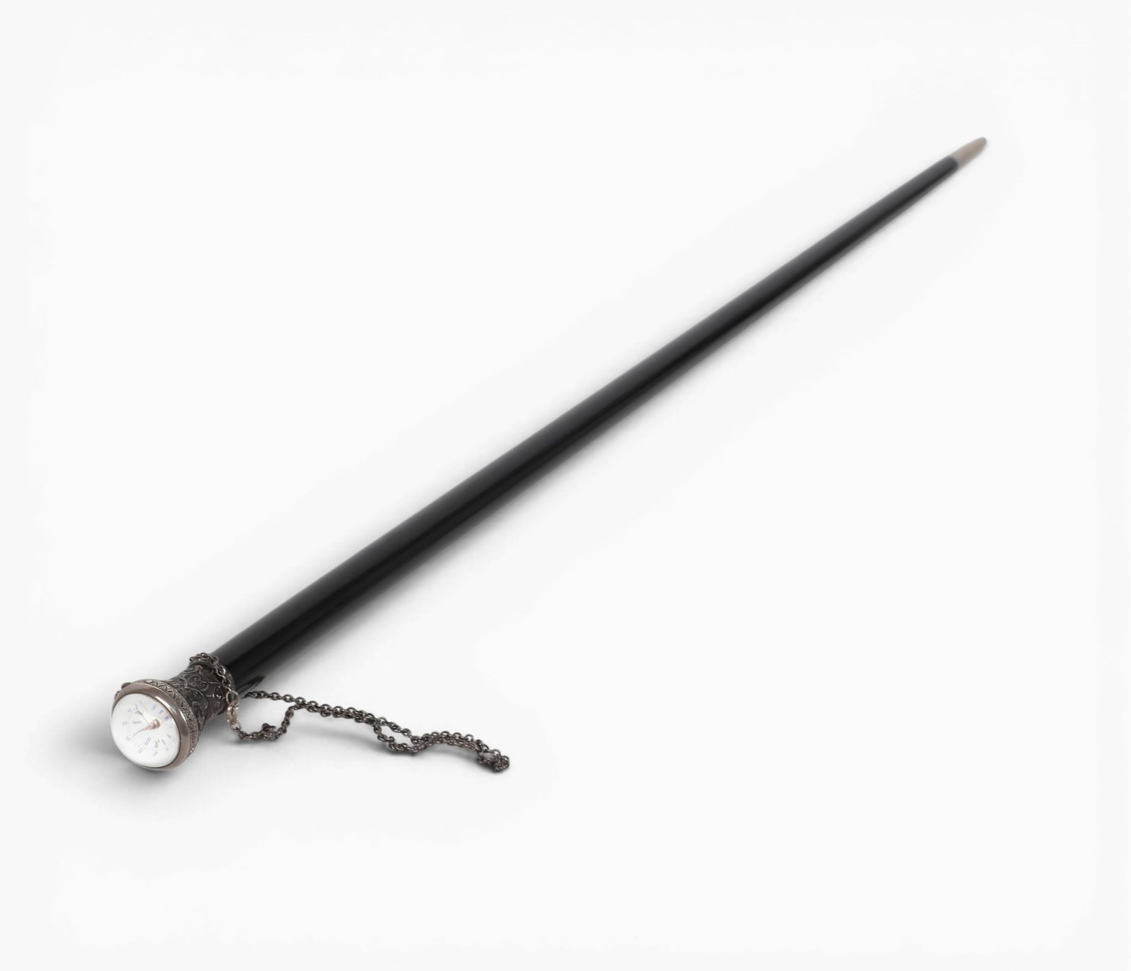 A German 800 standard silver mounted ebonized novelty watch walking cane, late 19th century: A German 800 standard silver mounted ebonized novelty watch walking cane late 19th century length 34 1/2in (87.5cm) Provenance: Property from the Collection of Ben Nysewander, Carmel, California.