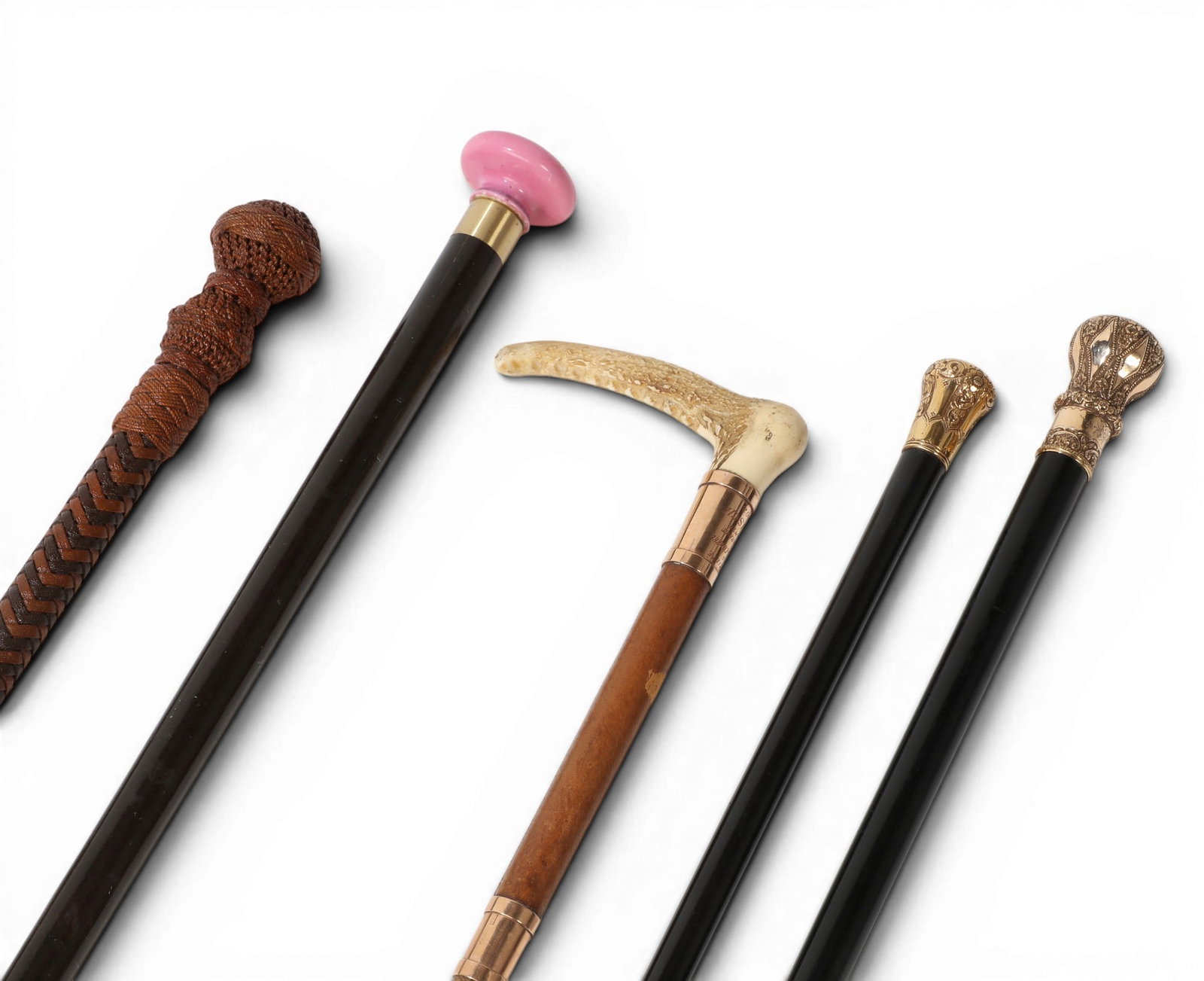 A group of four walking sticks and a riding crop, Swaine & Adeney (1 of 7)