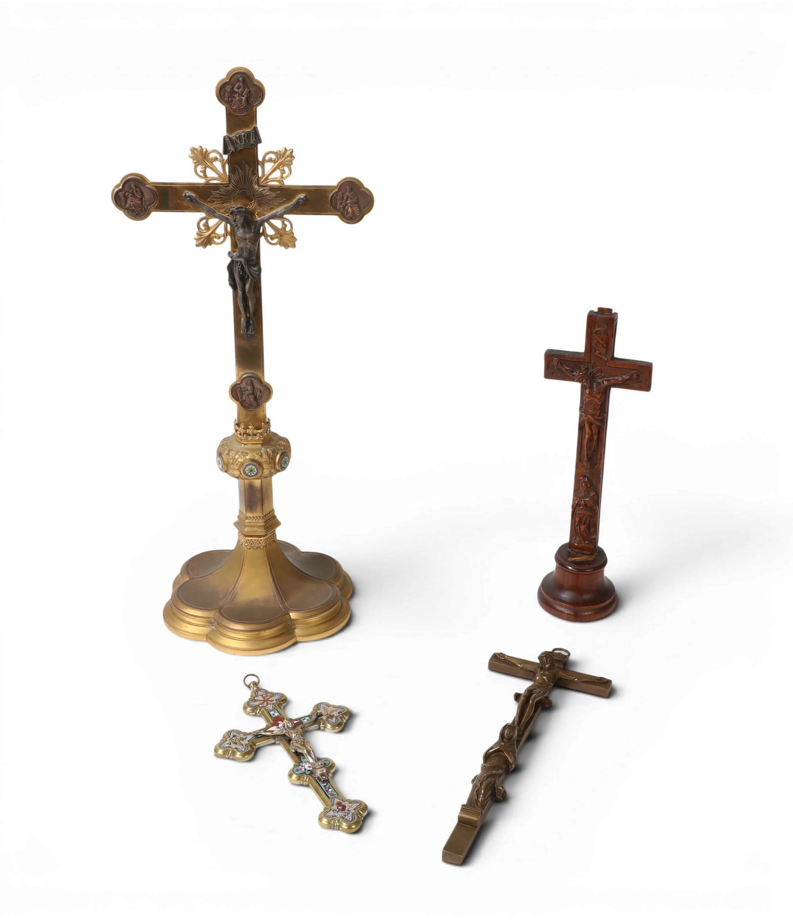 Four Continental mixed media crucifixes, 19th-20th century (1 of 4)
