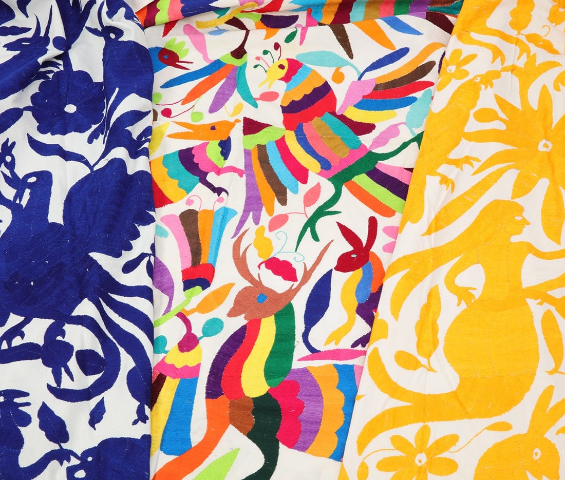 A collection of nine multicolored embroidered textiles, modern (1 of 4)