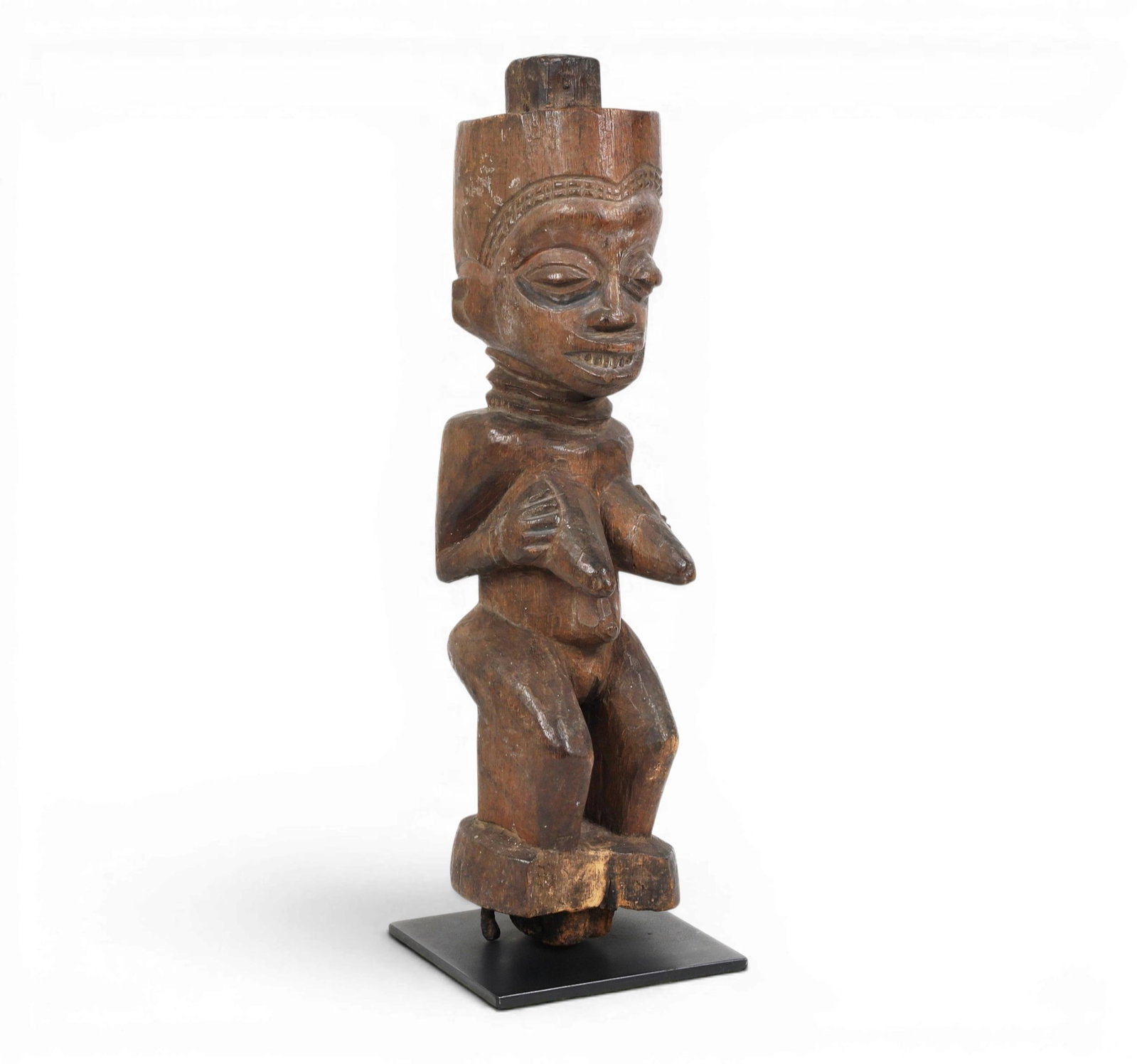 A Yoruba carved wood female figure (1 of 7)