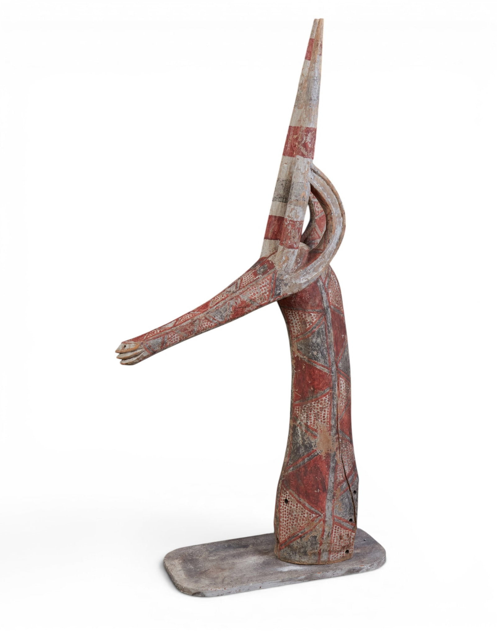 A Karumba painted wood antelope mask: A Karumba painted wood antelope mask overall height 54 1/2in (137cm); width 11 1/4in (28.5cm); depth 26 1/2in (66cm) Provenance: Property from the collection of Frederick M Nicholas, Beverly Hills, Ca