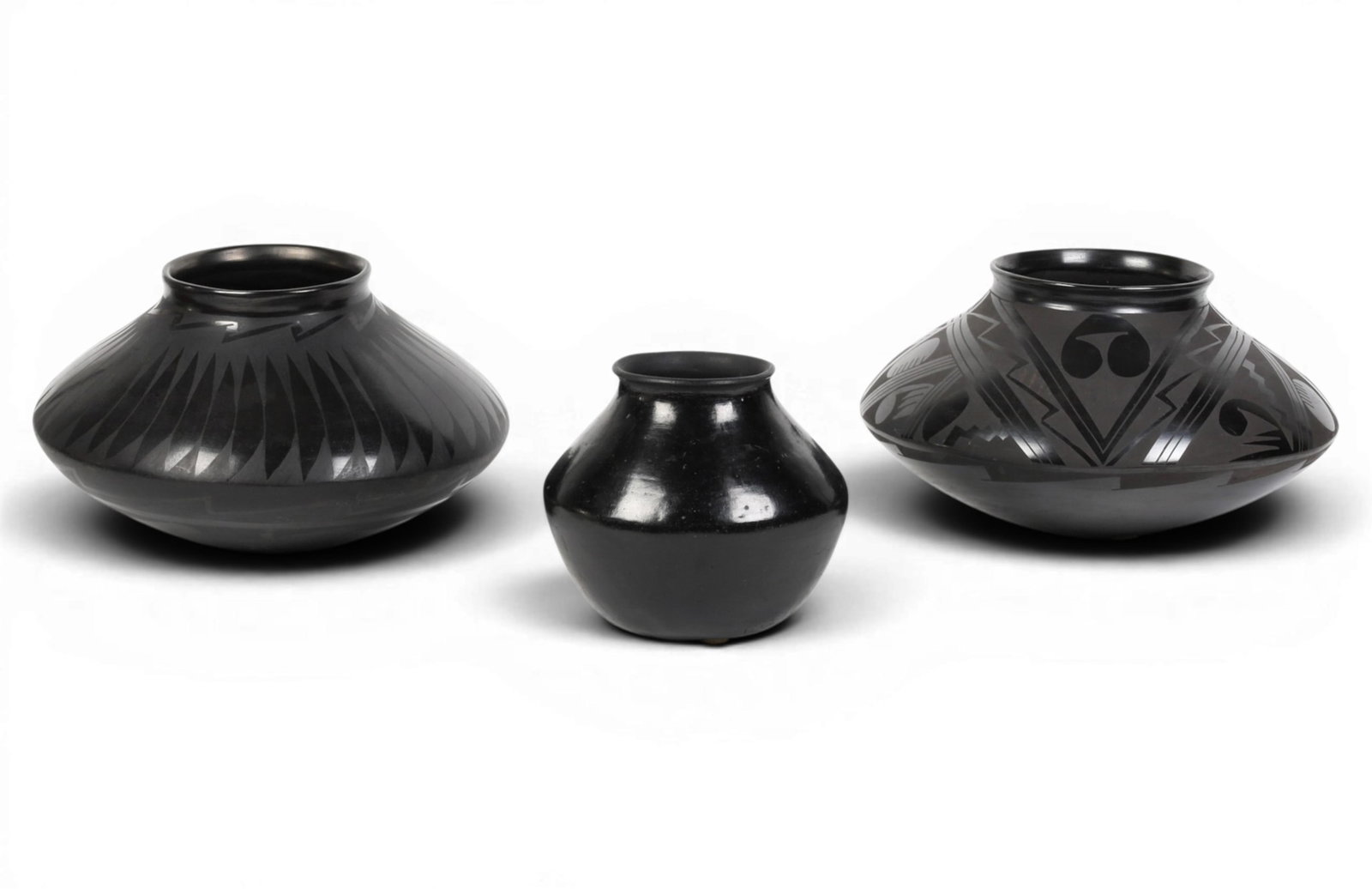 A group of three Mata Ortiz blackware ceramic vessels, mid 20th century (1 of 5)