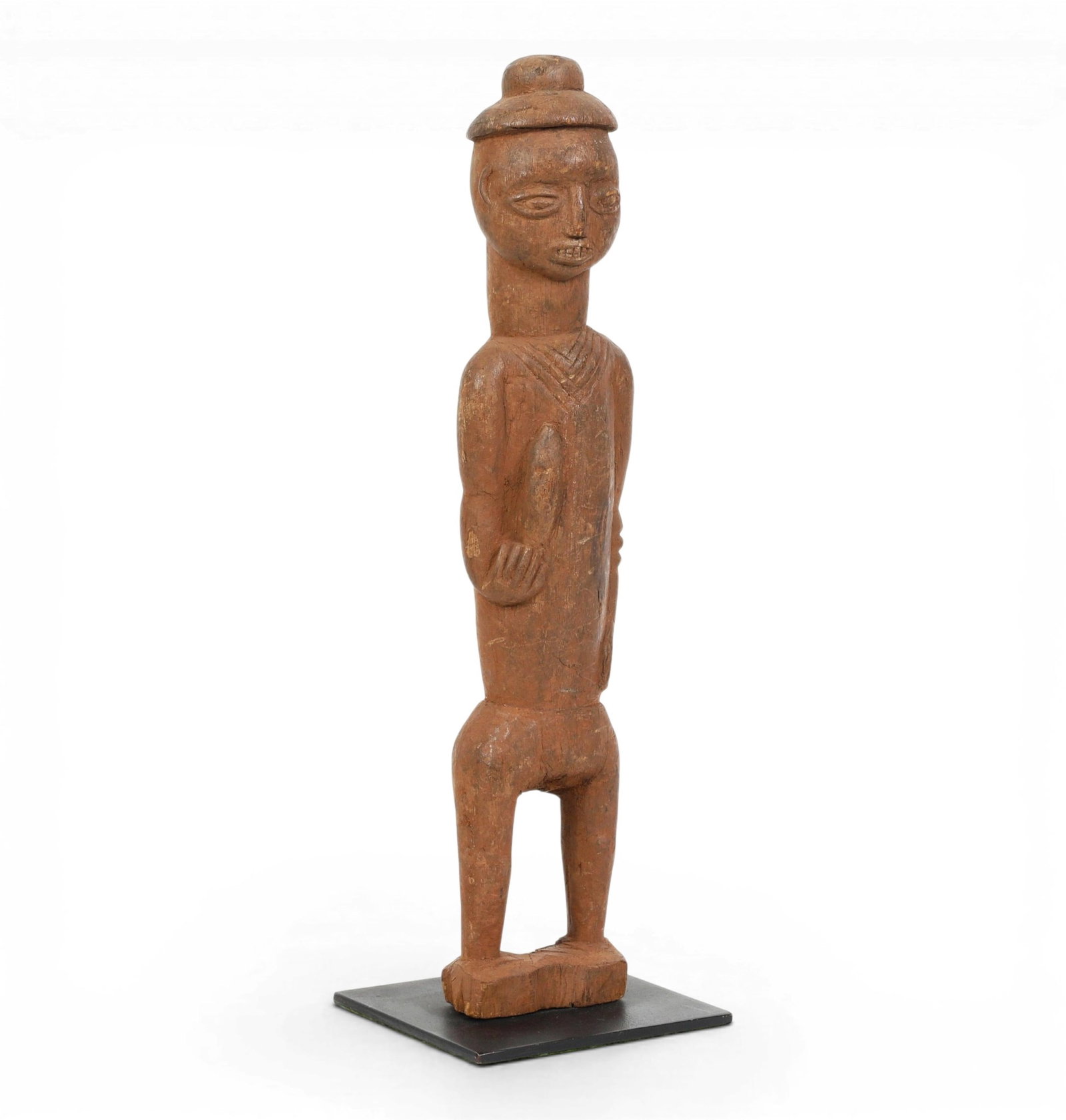 A Cameroon carved wood male figure (1 of 5)