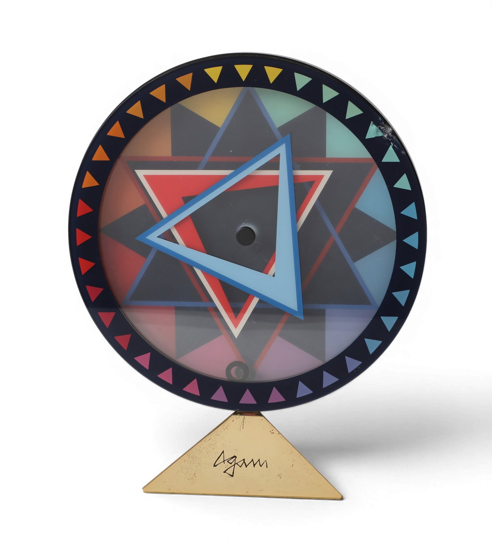 A Yaakov Agam for Movado Love Star desk clock, circa 1989: A Yaakov Agam for Movado Love Star desk clock circa 1989 Artists name inscribed to base, battery operated and numbered 223/250 and 87.802.10 N. height 8 1/4in (21cm); width 6 1/2in (16.5cm); depth 3 1
