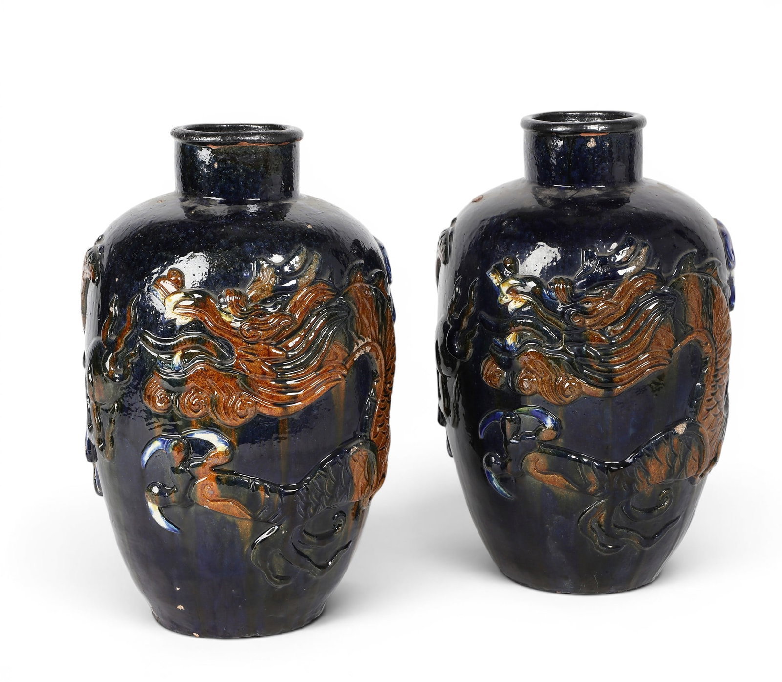 A pair of Asian blue ground and sancai glazed earthenware Martaban jars (1 of 4)