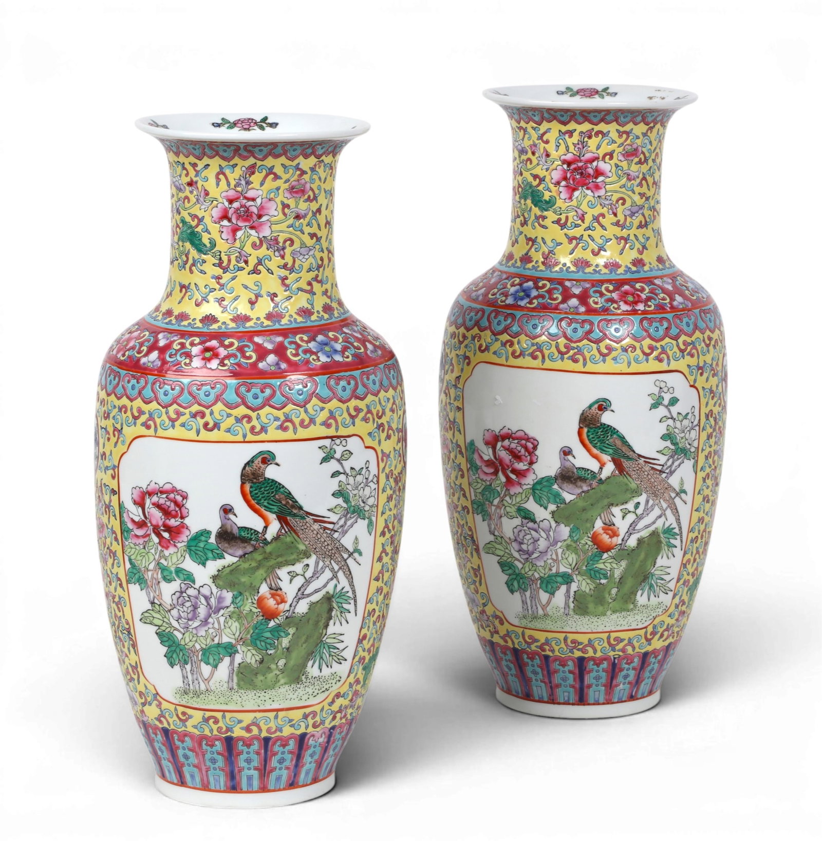 A pair of Chinese Famille Jaune porcelain vases: A pair of Chinese Famille Jaune porcelain vases With square seal marks to underside. height 17in (43cm); diameter 8in (20cm)
