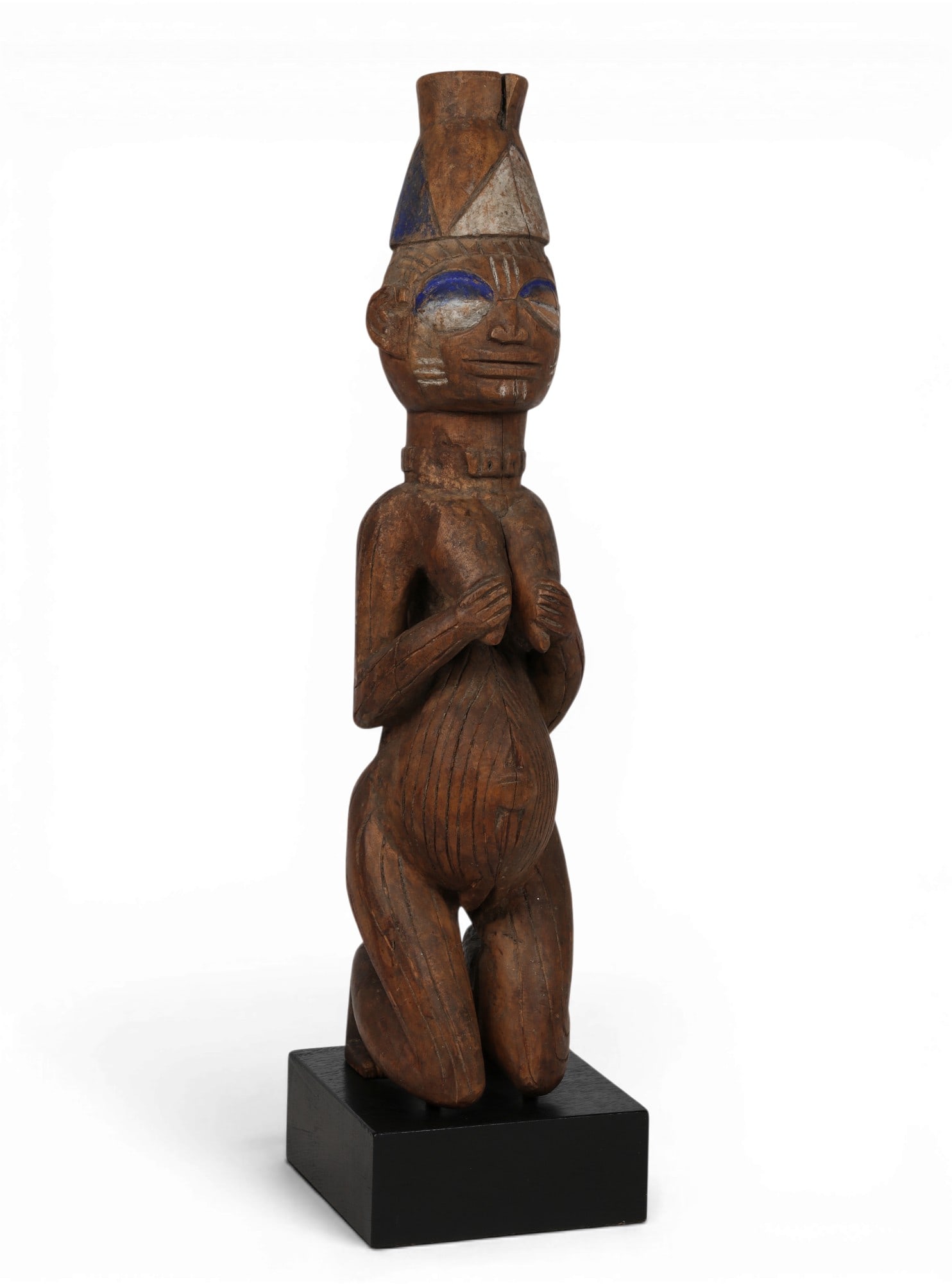 A Yoruba carved wood female figure (1 of 5)