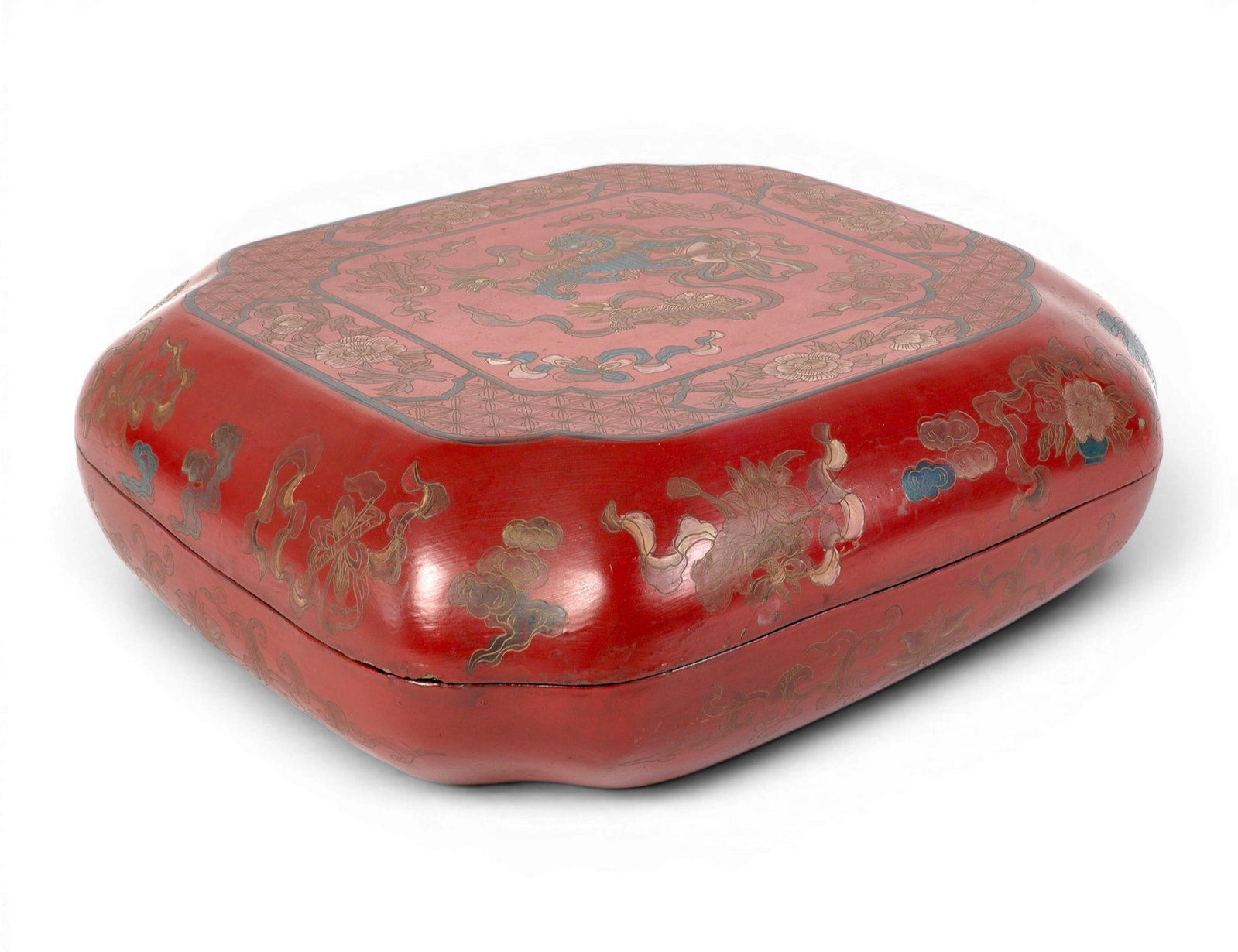 A Chinese red lacquer table box: A Chinese red lacquer table box height 5 1/2in (14cm); width 15 1/2in (39cm) square