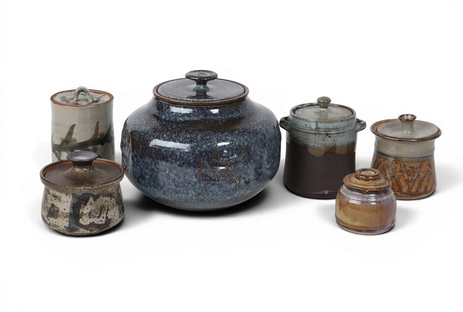 A group of six pottery covered jars (1 of 7)