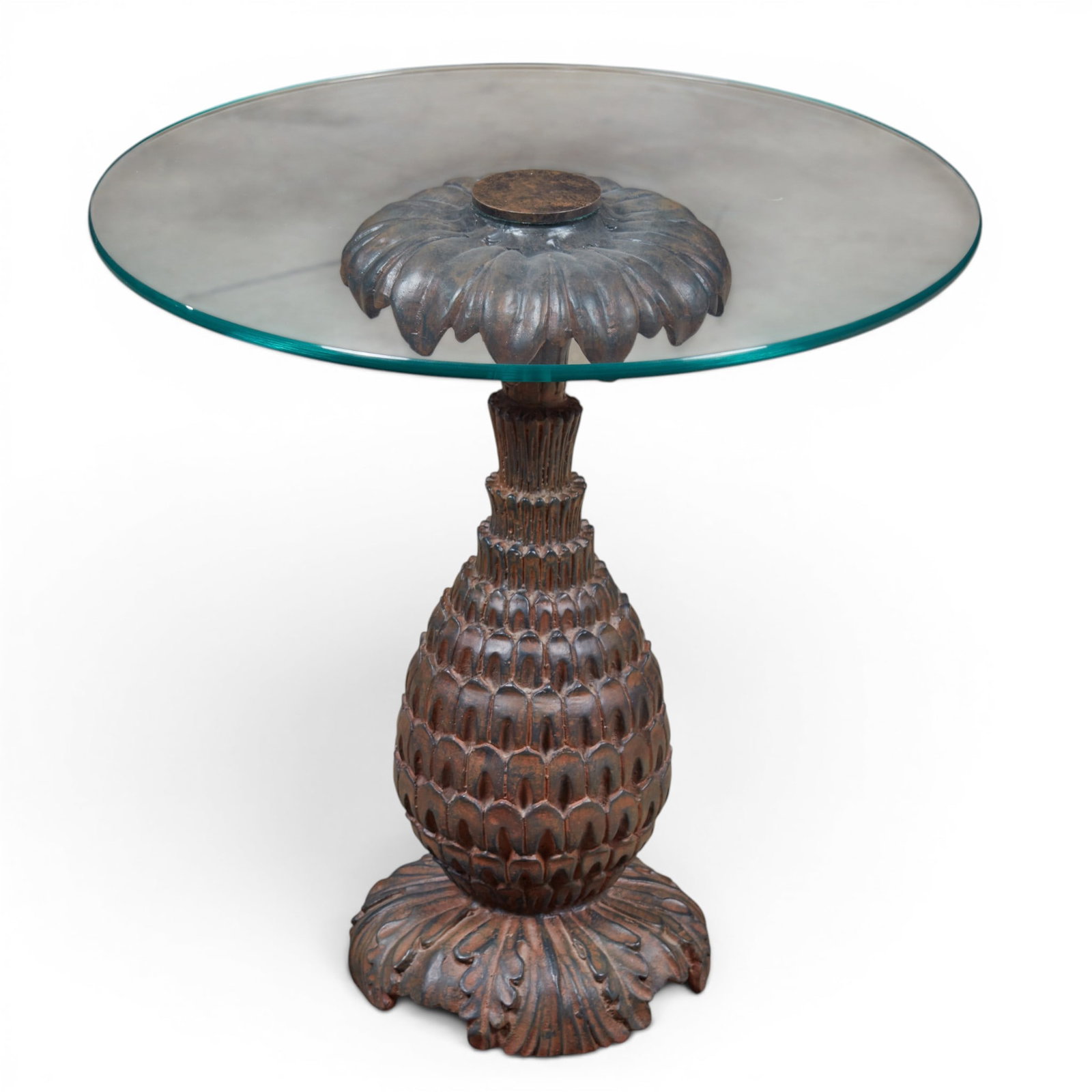 An iron pineapple shaped occasional side table with glass top: An iron pineapple shaped occasional side table with glass top height 19 x diameter 20 in. (48.3 x 50.8 cm.)