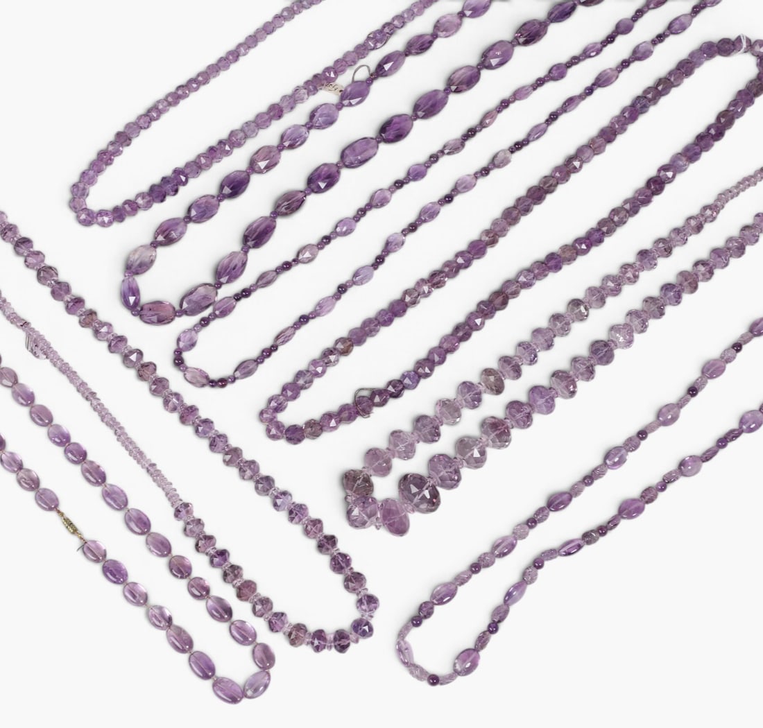 A group of eight amethyst bead necklaces: A group of eight amethyst bead necklaces