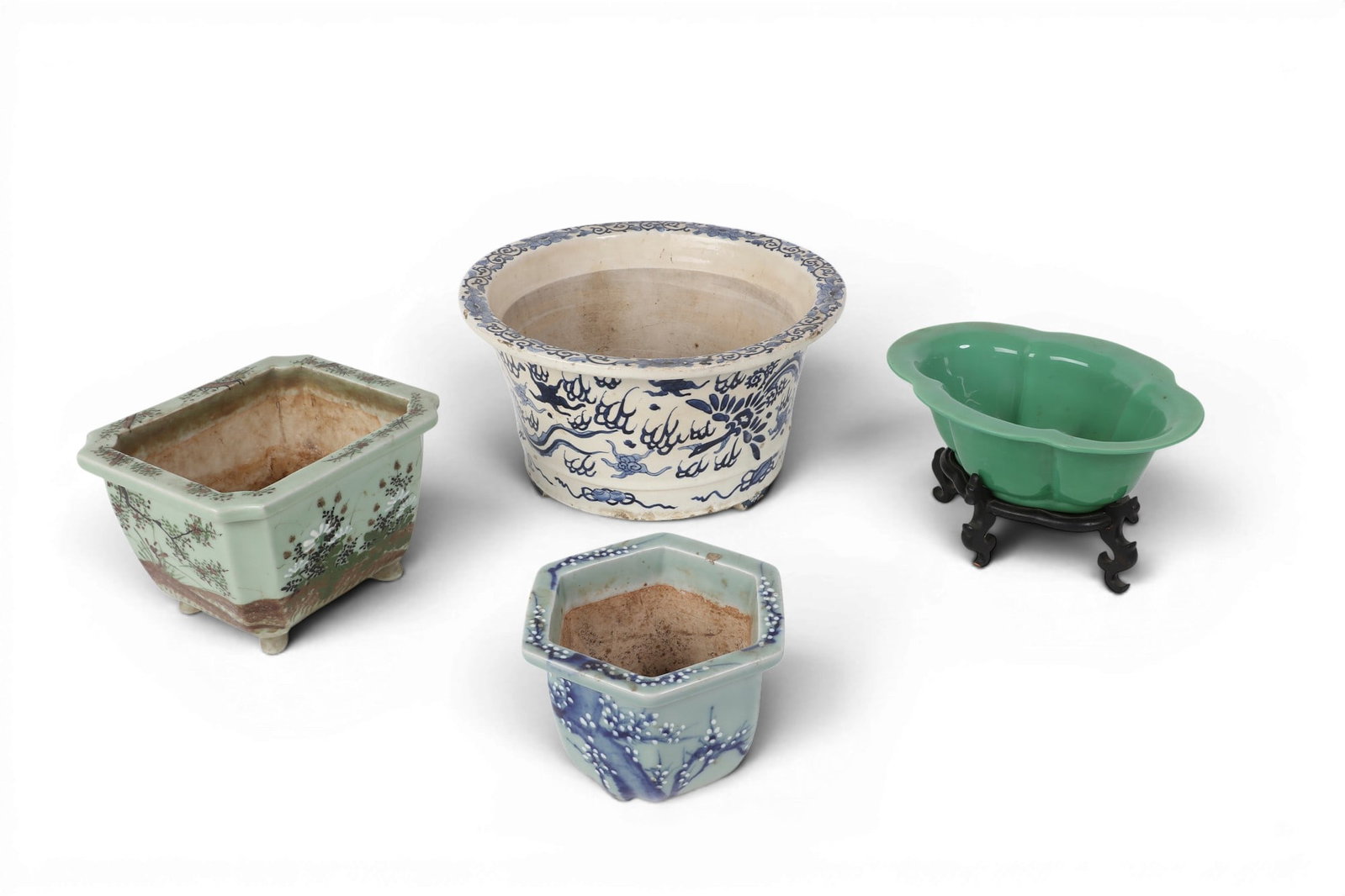 three Chinese ceramic, and a glass vessels (1 of 4)