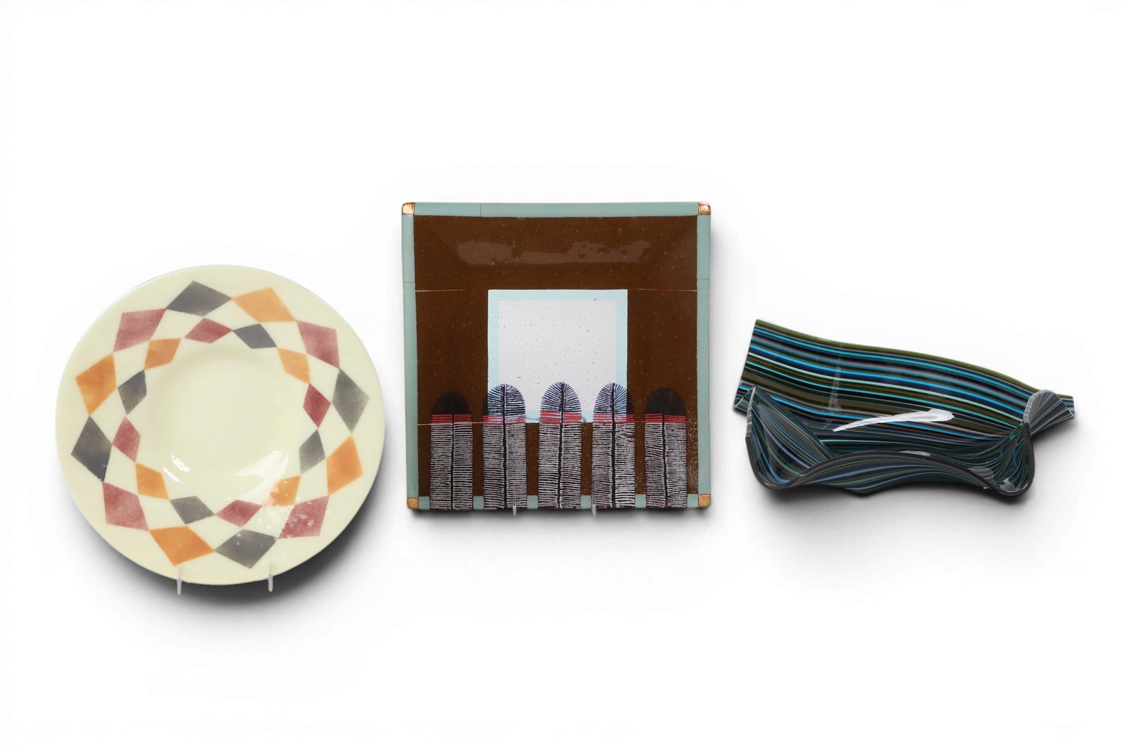 A group of three art glass dishes and bowls: A group of three art glass dishes and bowls Largest: height 7 x width 13 x depth 17 1/2 in. (17.8 x 33 x 44.5 cm.)