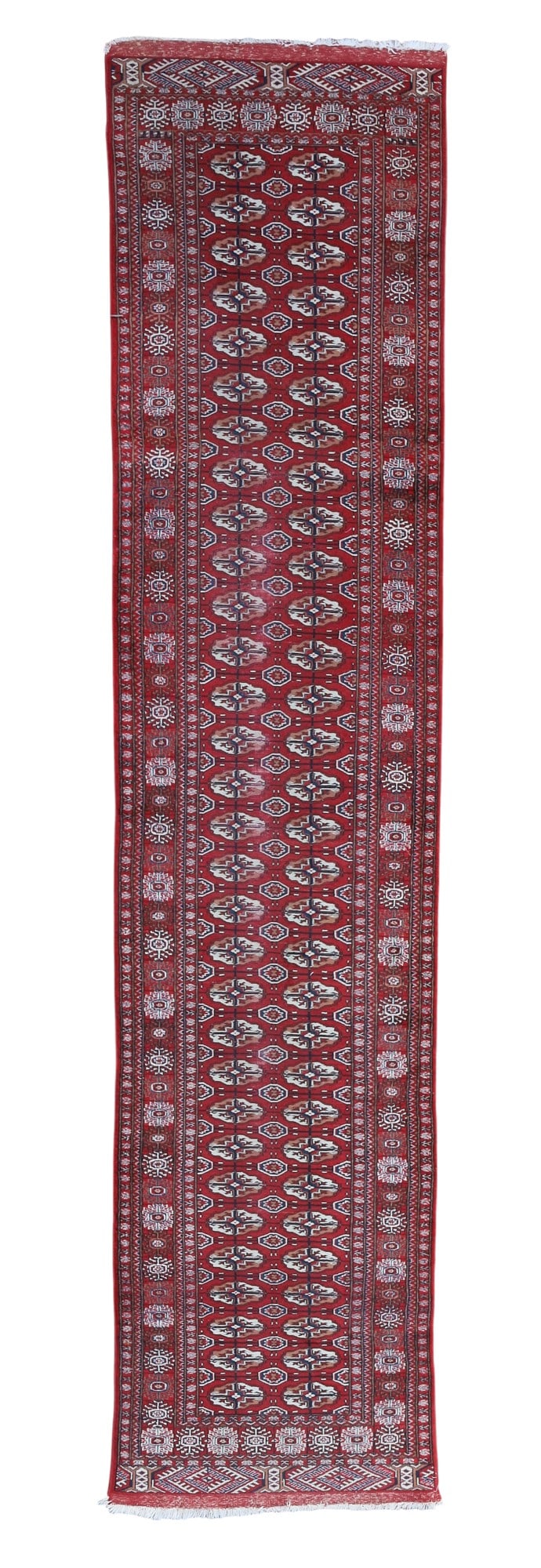 A Tekke Bokara, Pakistan: A Tekke Bokara Pakistan approximately 3ft x 11ft (91x 335cm)