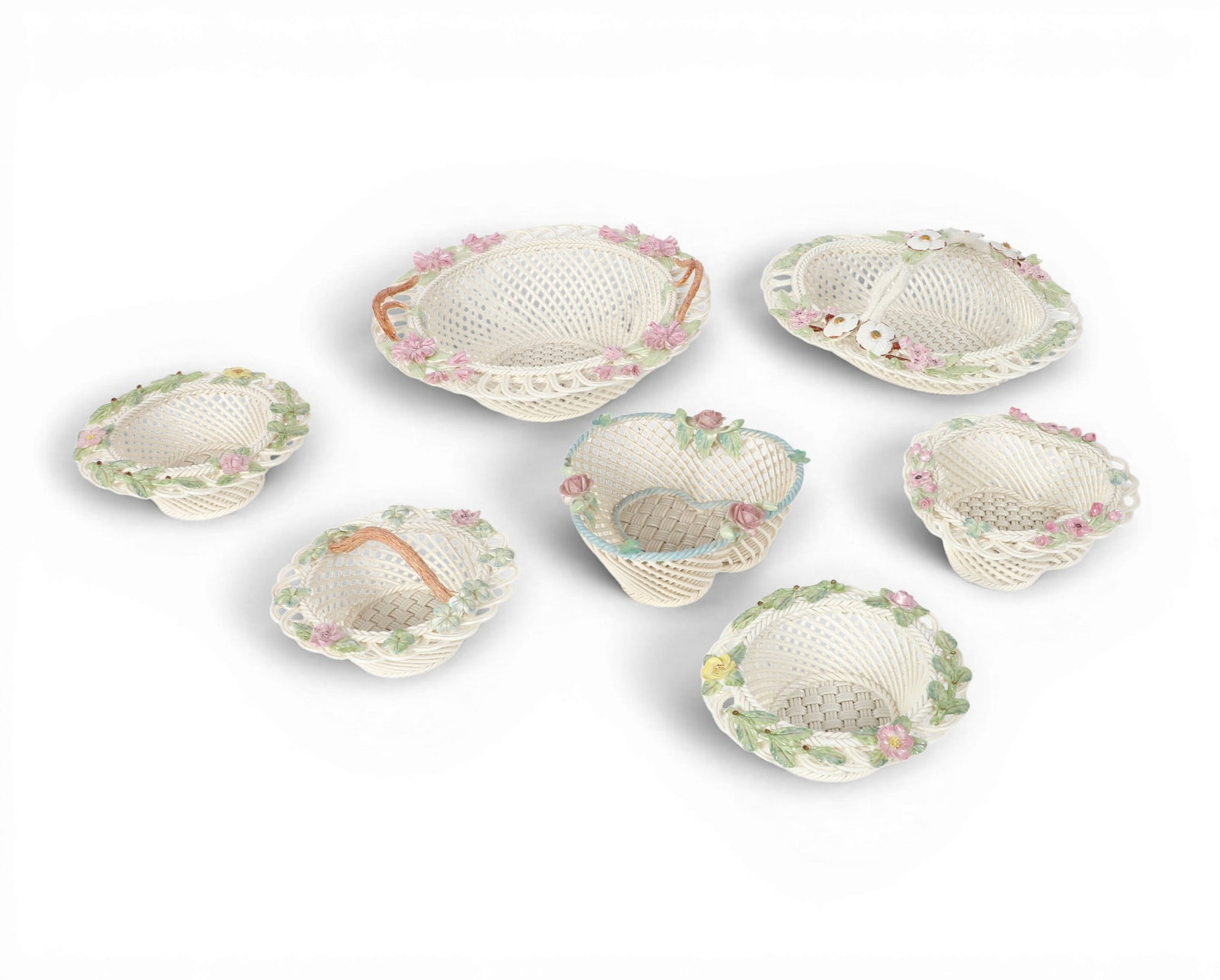 A group of seven assorted Belleek porcelain reticulated baskets, 1993-1997 (1 of 5)