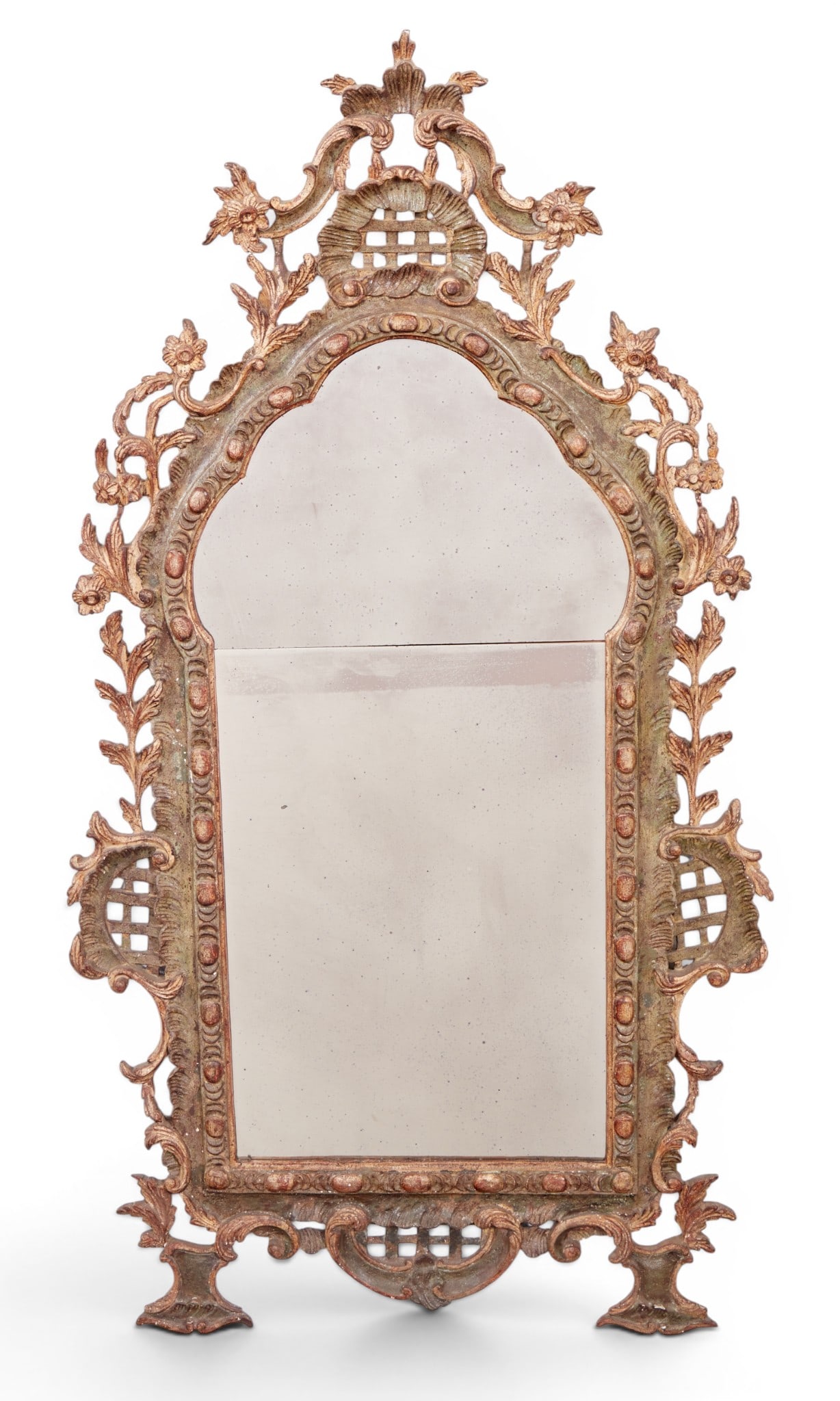 A vintage italian rococo style parcel gilt mirror: A vintage italian rococo style parcel gilt mirror 65 x 34 in. (165.1 x 86.4 cm.)